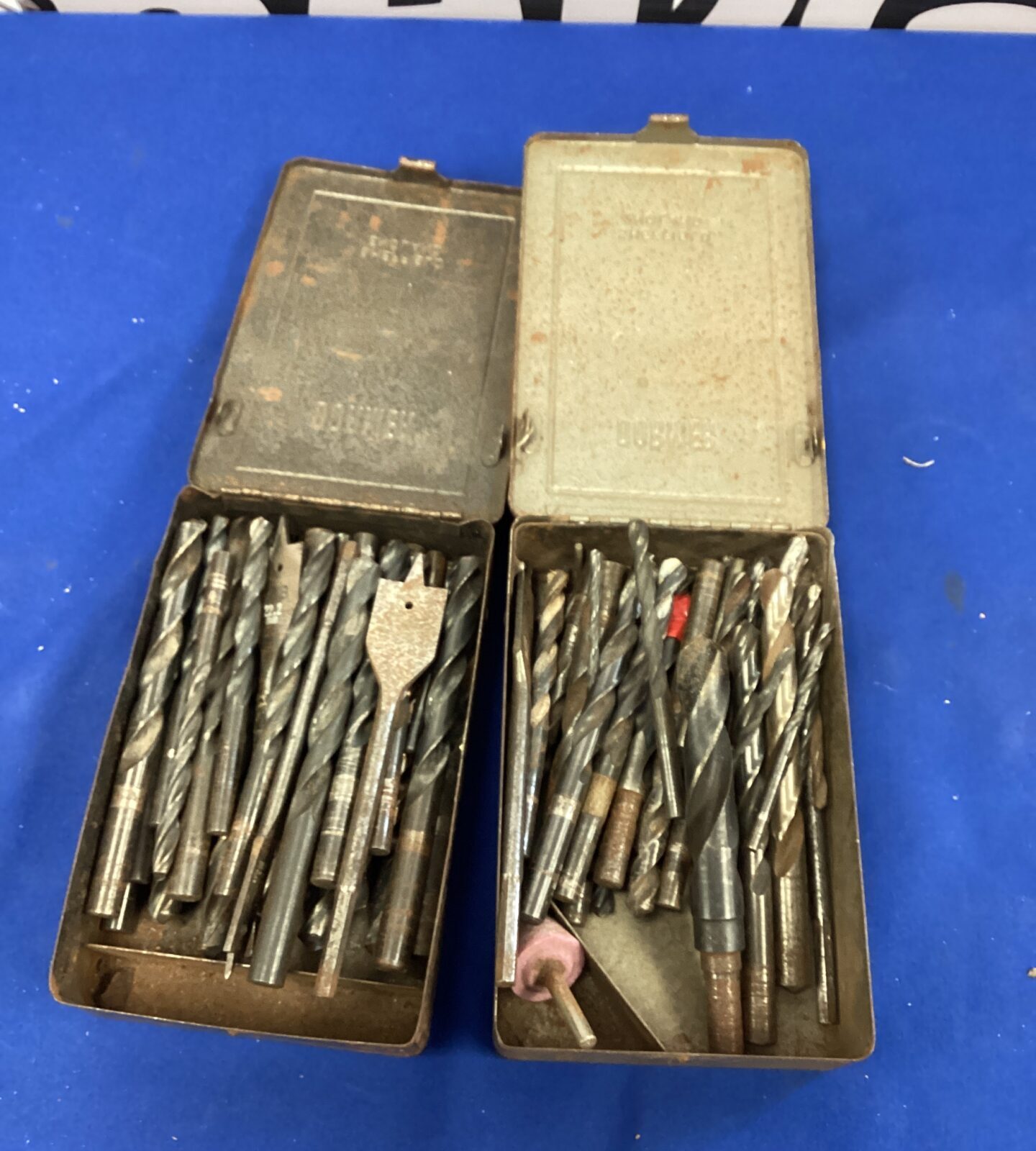 Two boxes of metal drill bits