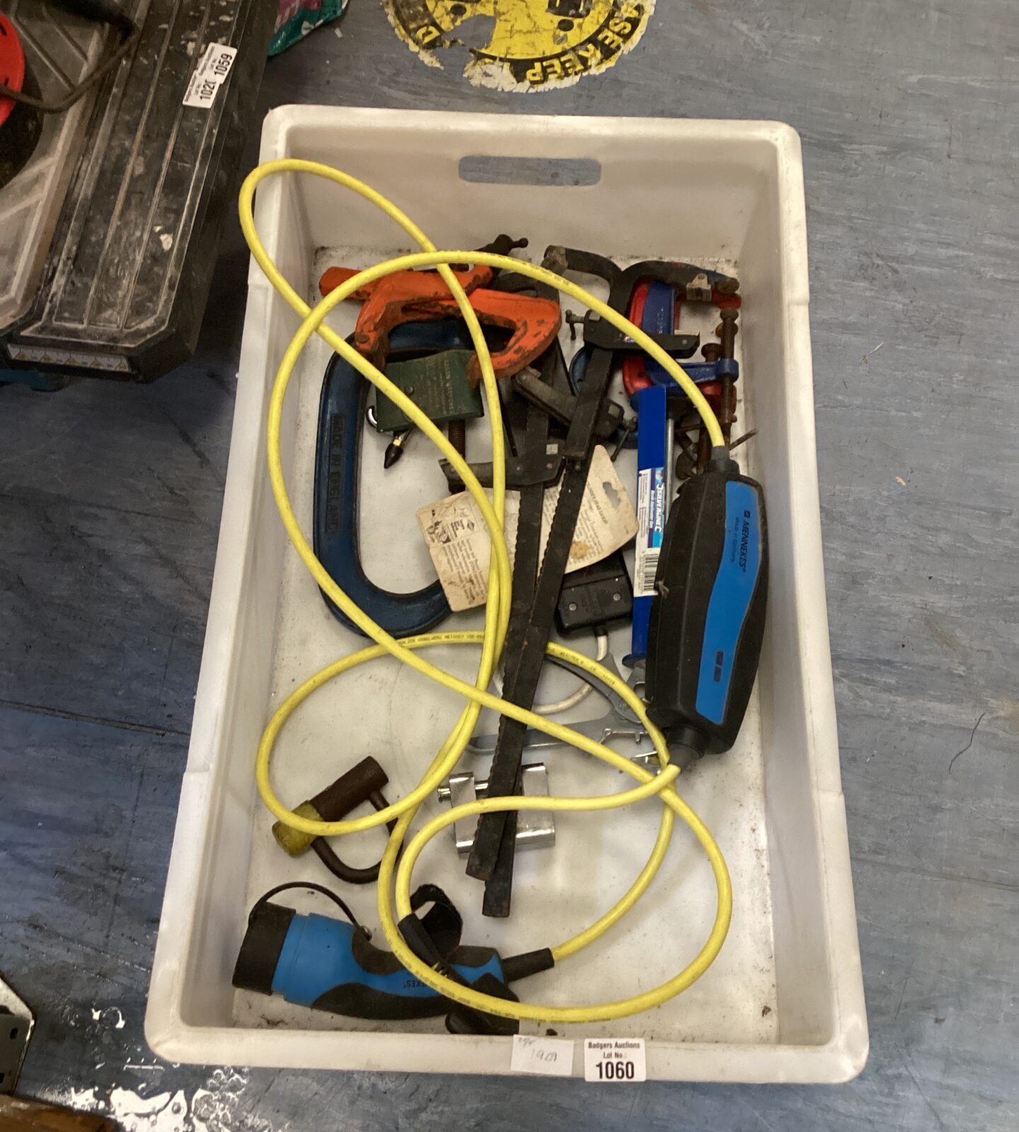 Mixed box of clamps with car charger cable