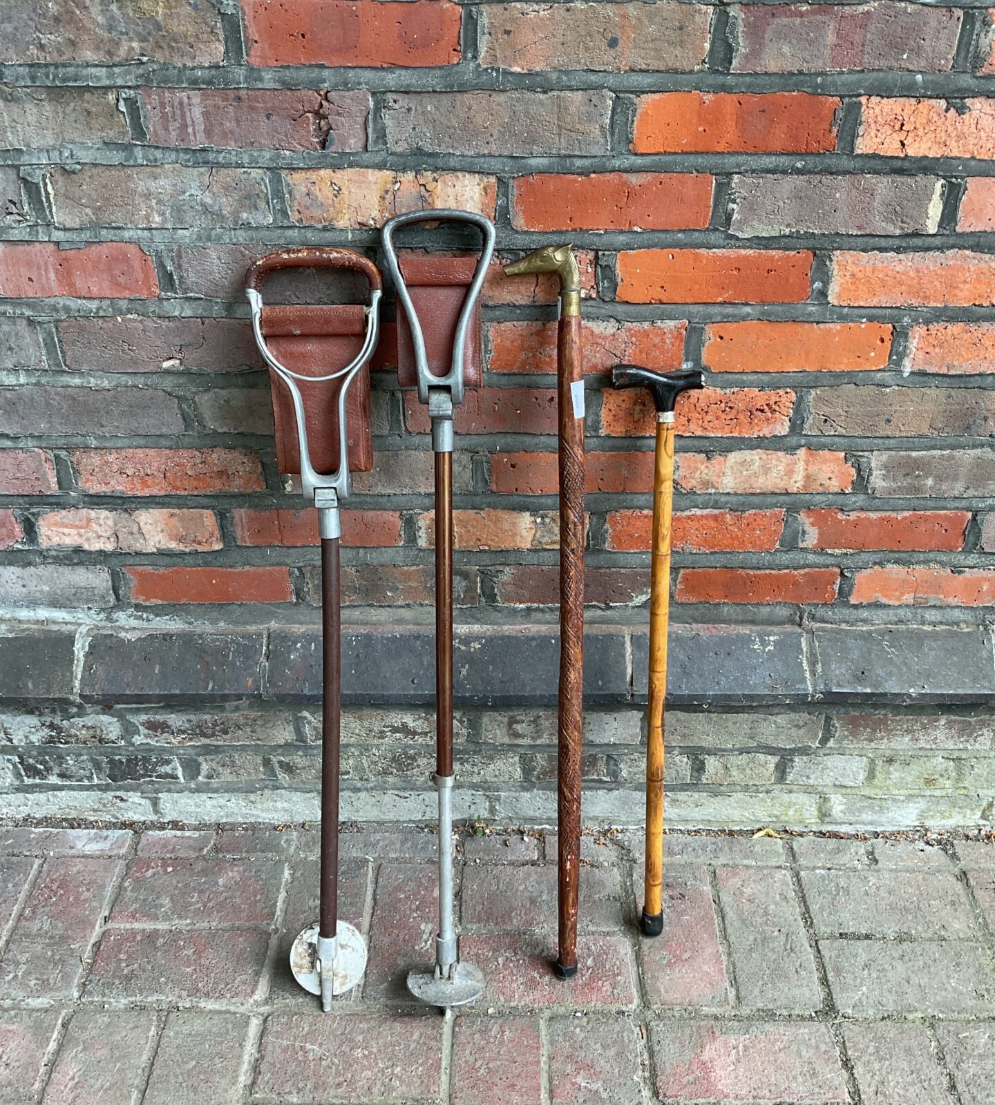 Two vintage shooting sticks & walking sticks