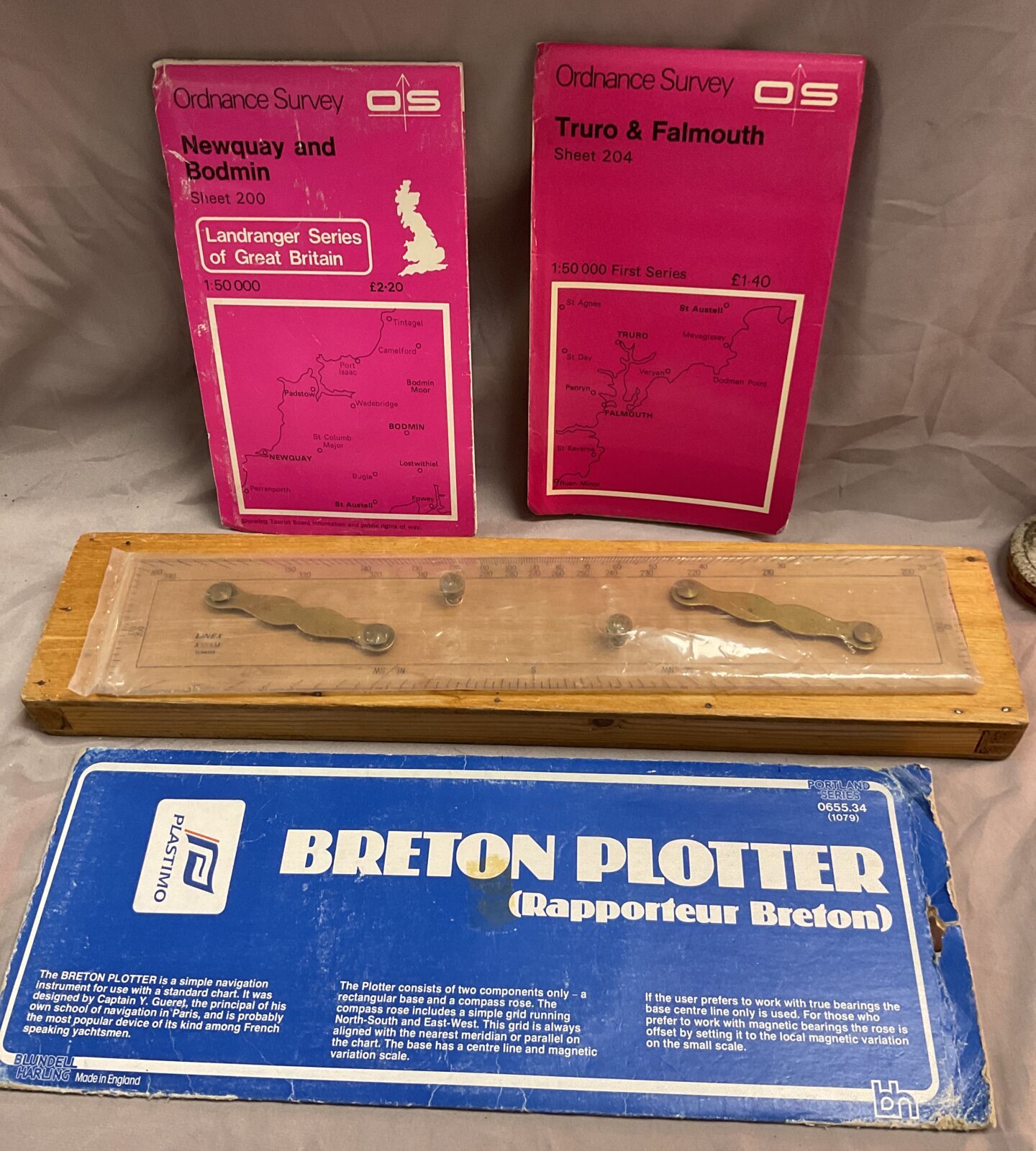 Breton plotter and navigation Parallel rule and two ordnance survey maps