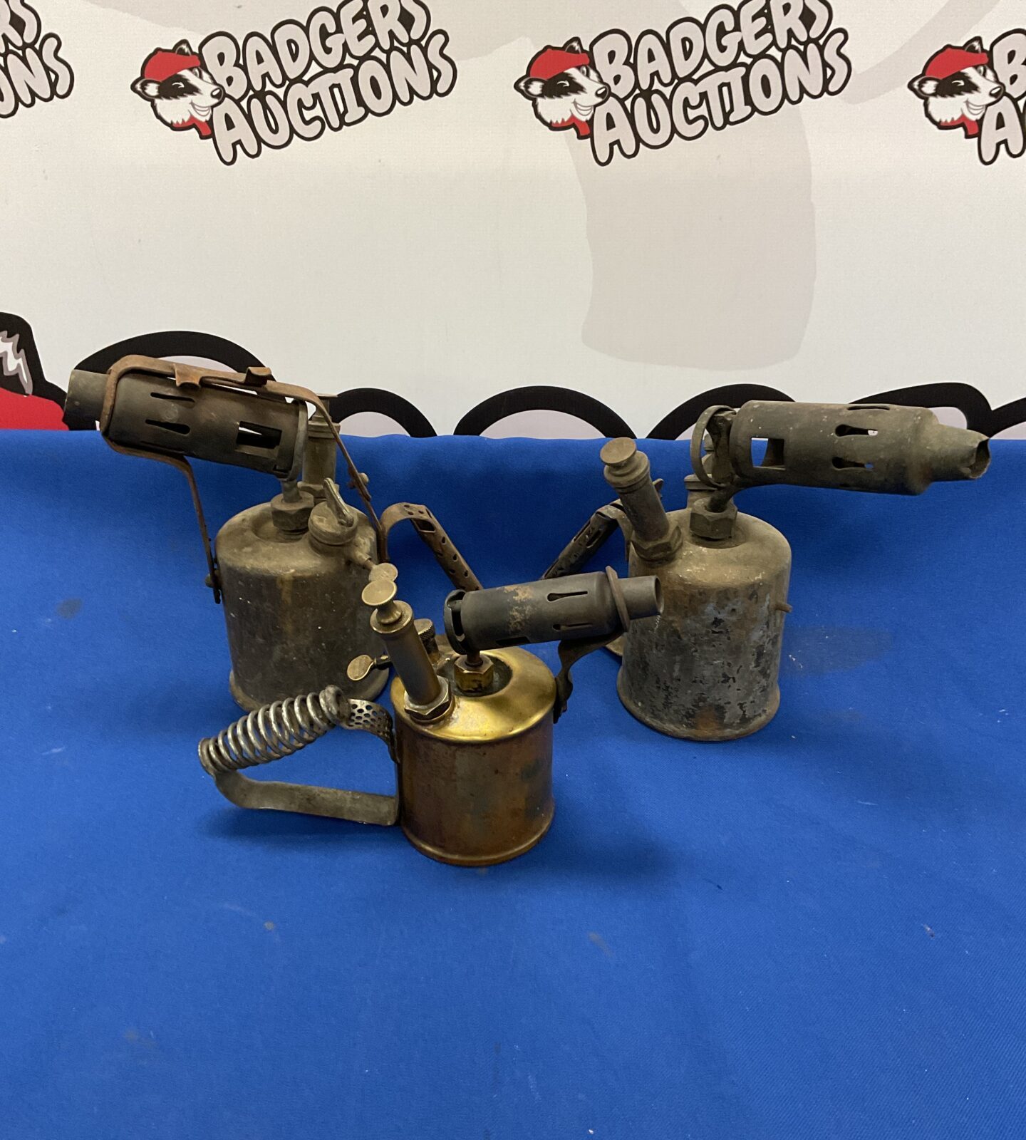 Three vintage brass blowlamps