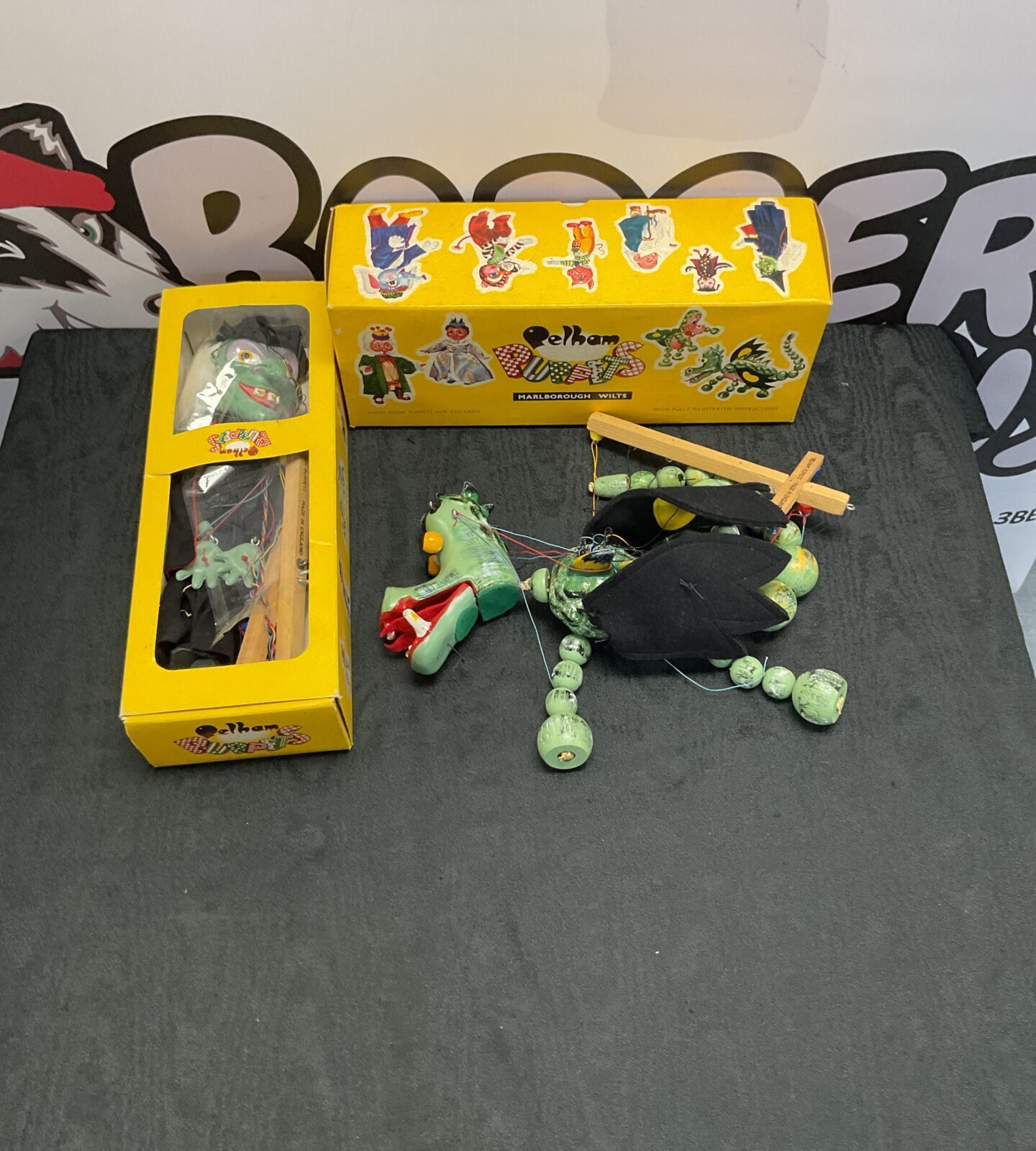 Two vintage boxed pelham puppets inc the wicked witch and mother dragon