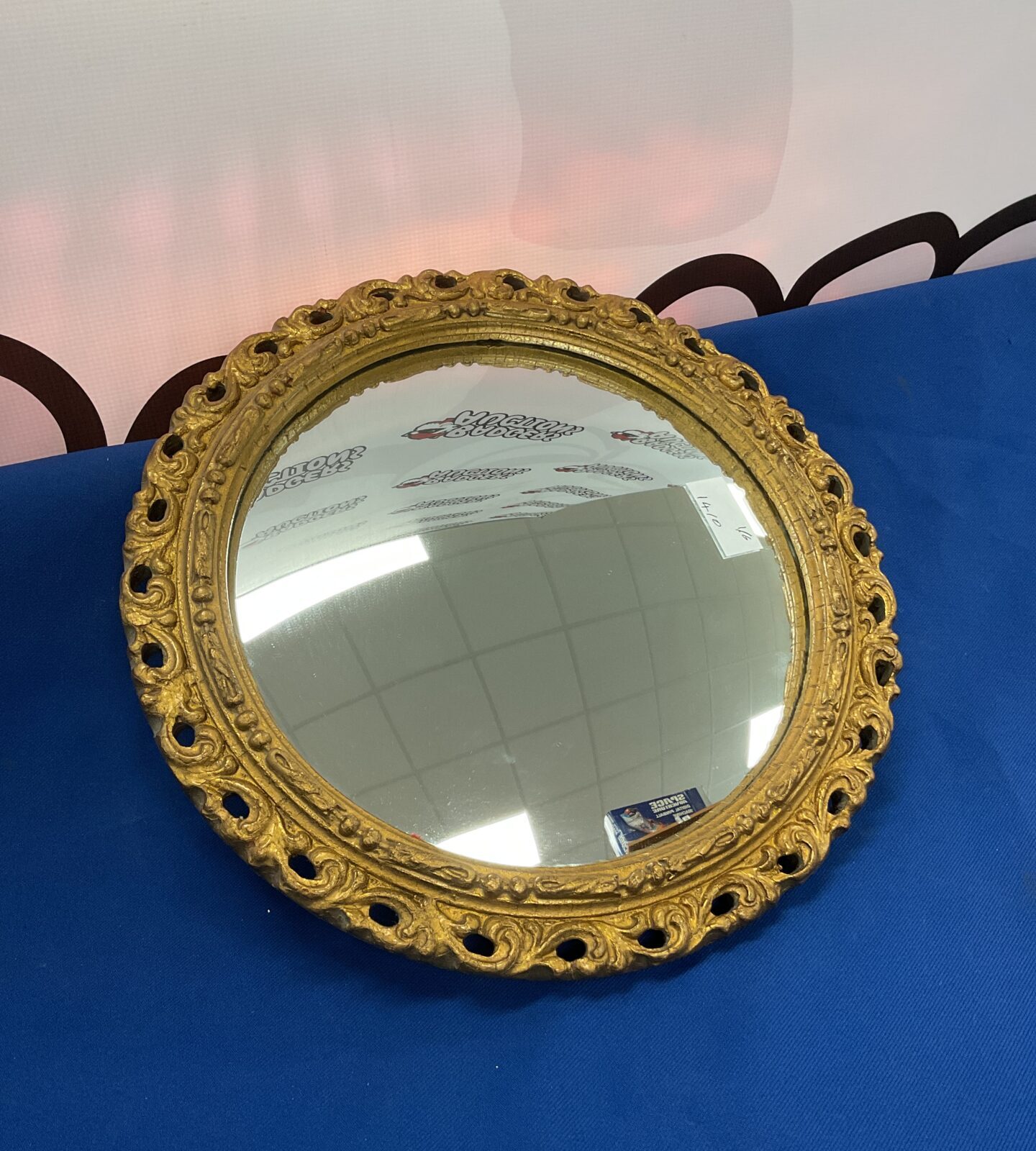 Small gilt framed round convex french style mirror