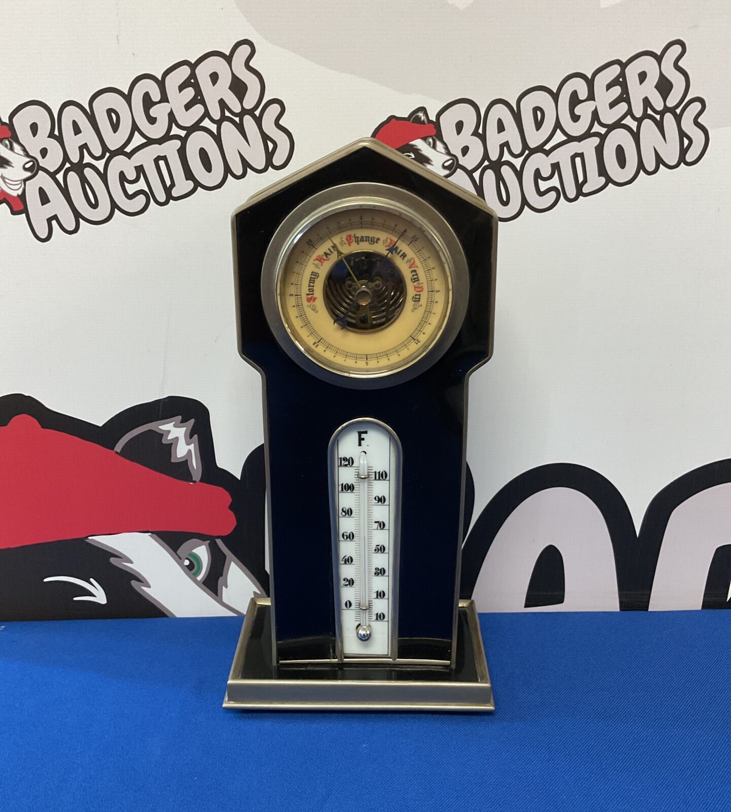 Vintage mercury desktop barometer in metal clock style case