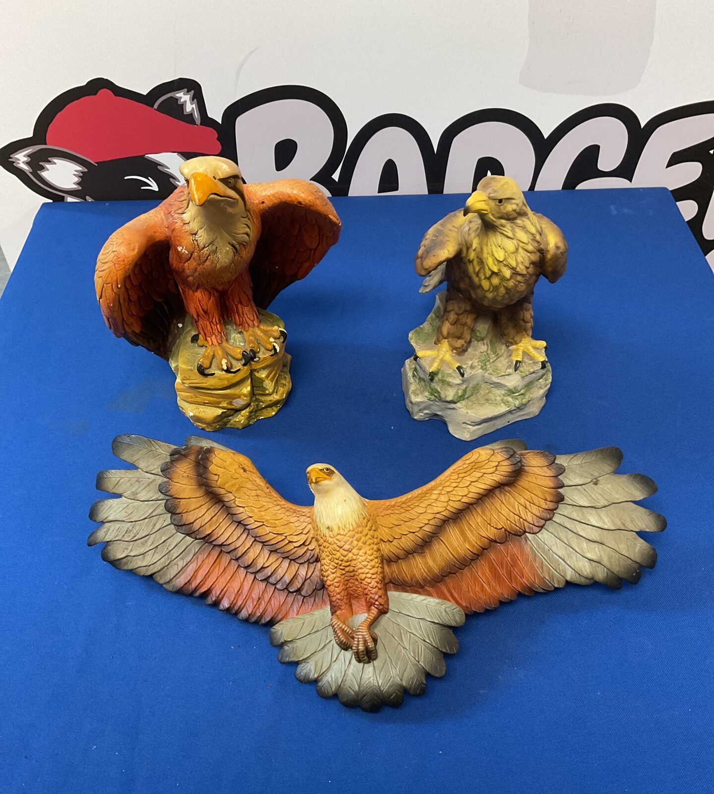 Three vintage eagle ornaments including fraser arts wall hanging & marcus chalkware eagle