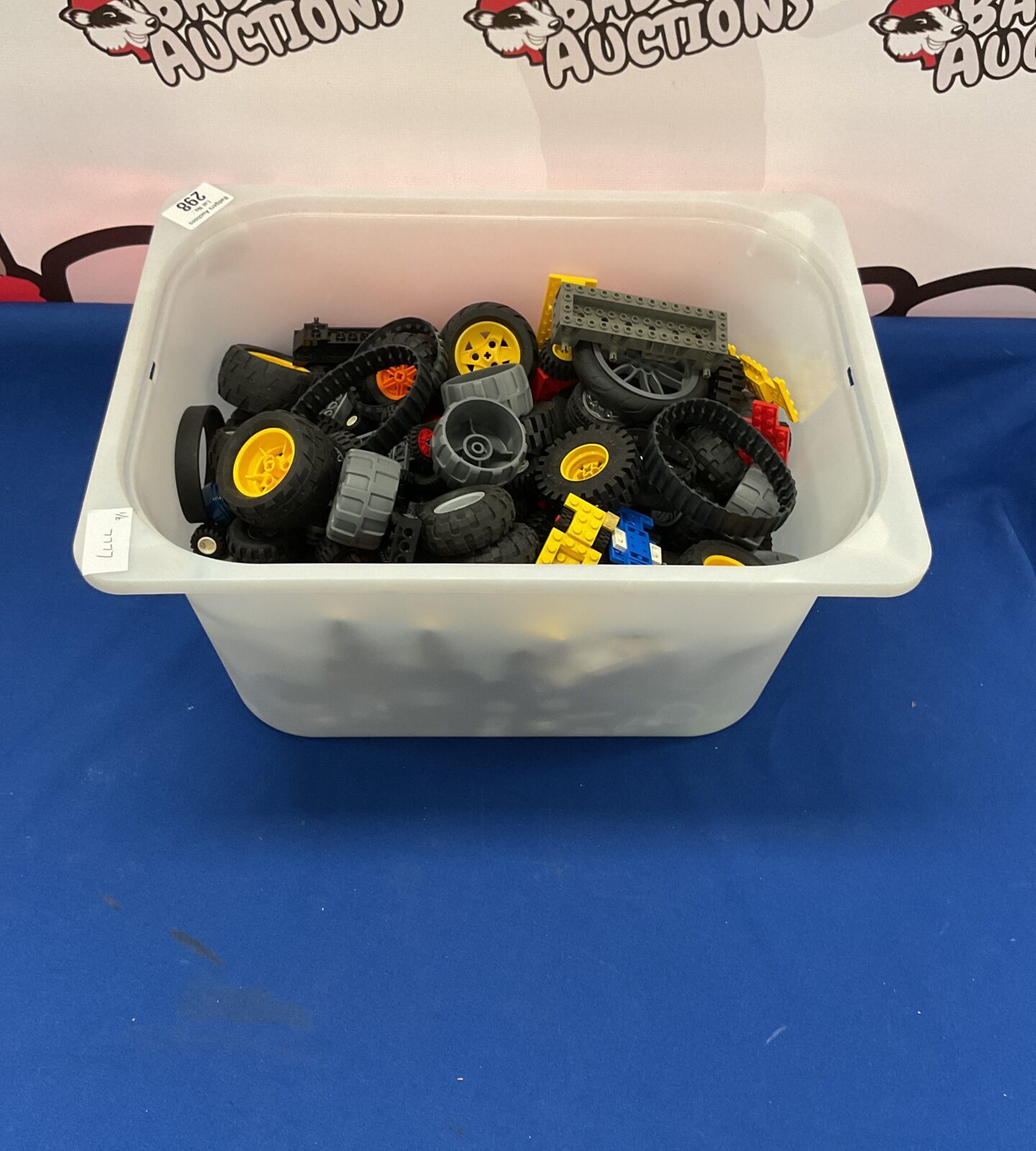Large box of mixed Lego Wheels and rims