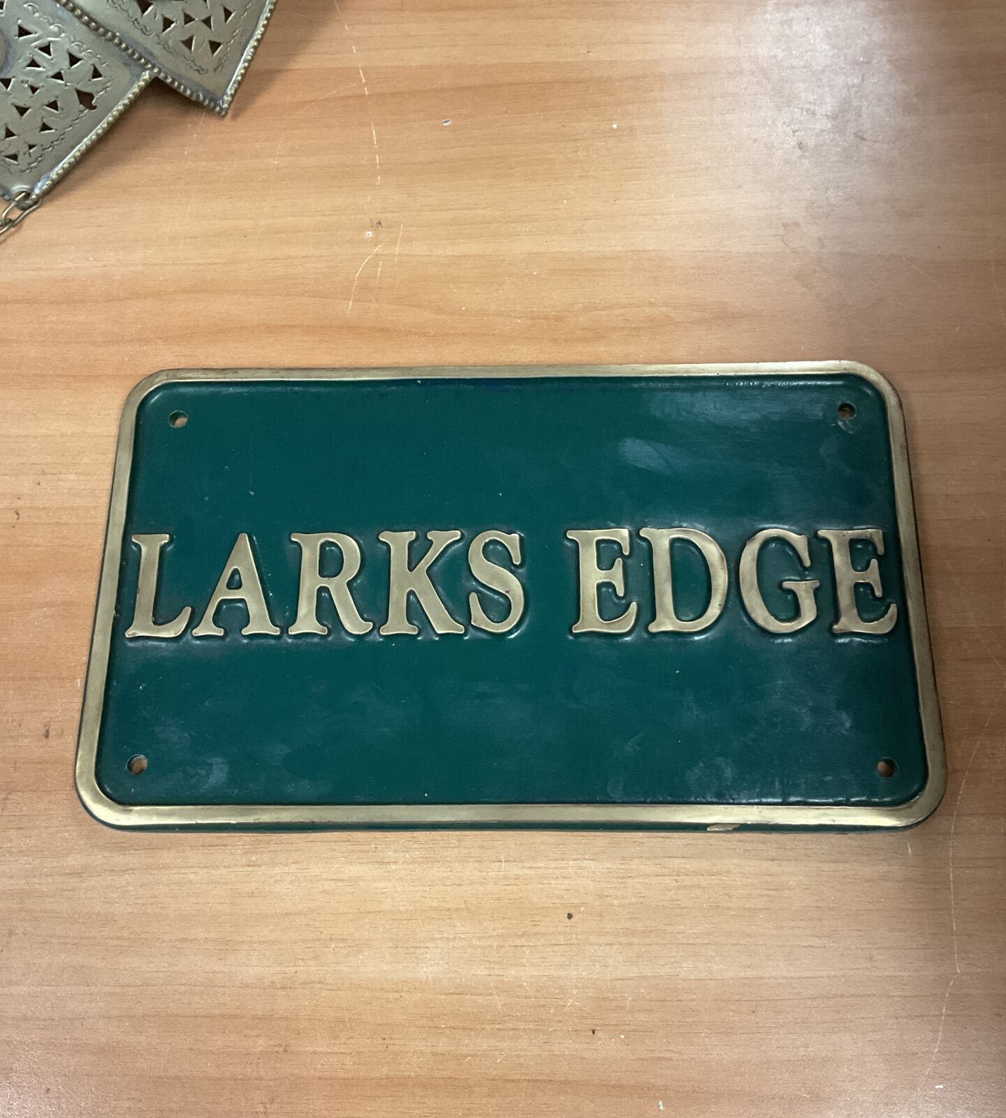 Heavy brass larks edge plaque 12” x 7”