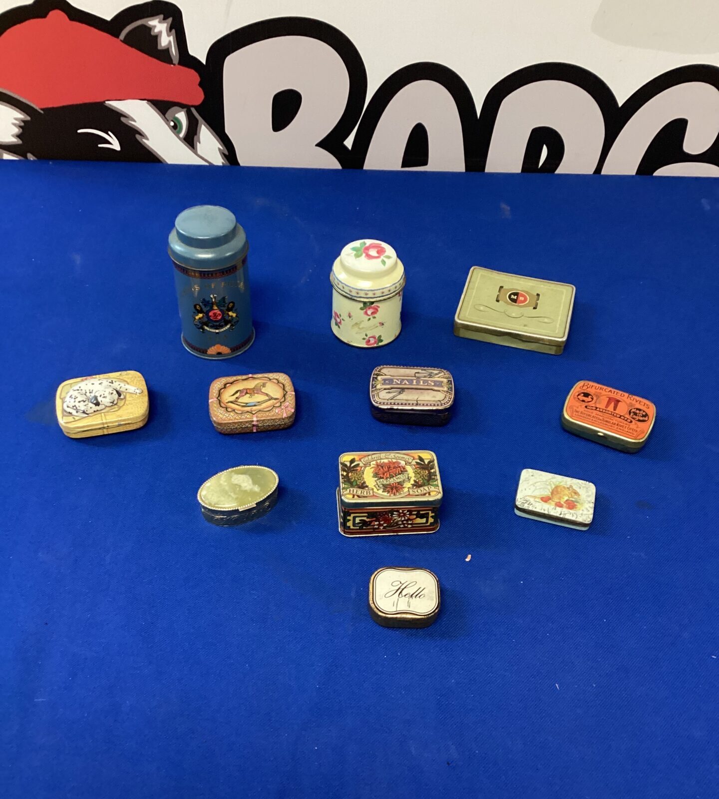 Selection of miniature vintage tins