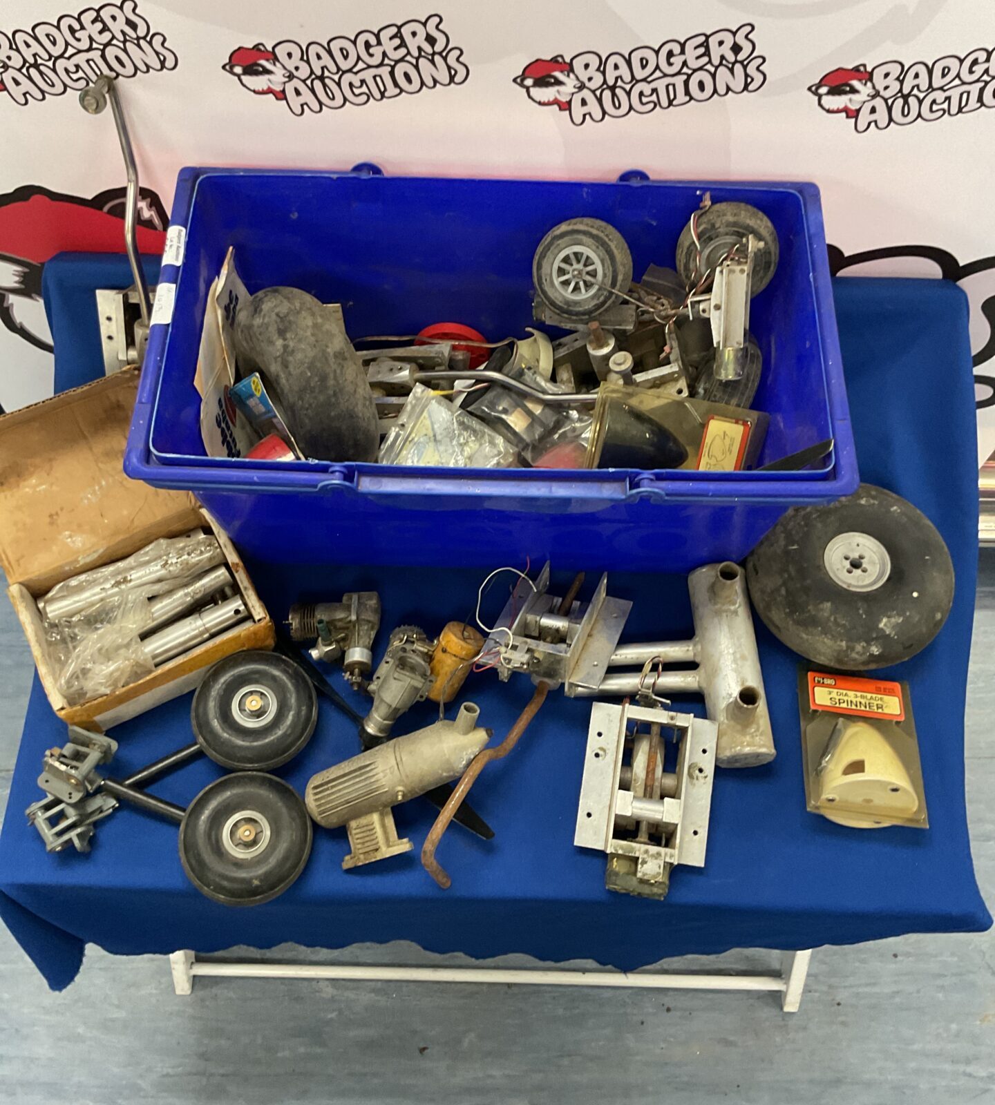 Box of vintage model aircraft parts and accessories