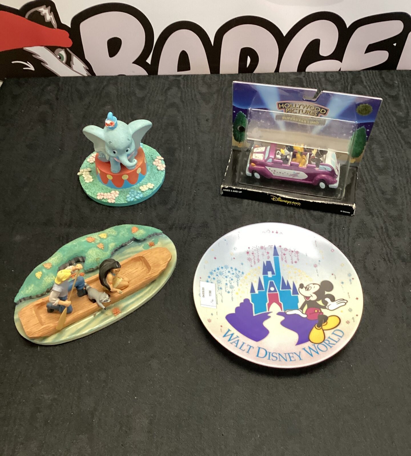 Four disney collectibles inc disney world plate, dumbo & Pocahontas ornaments & superstar limo