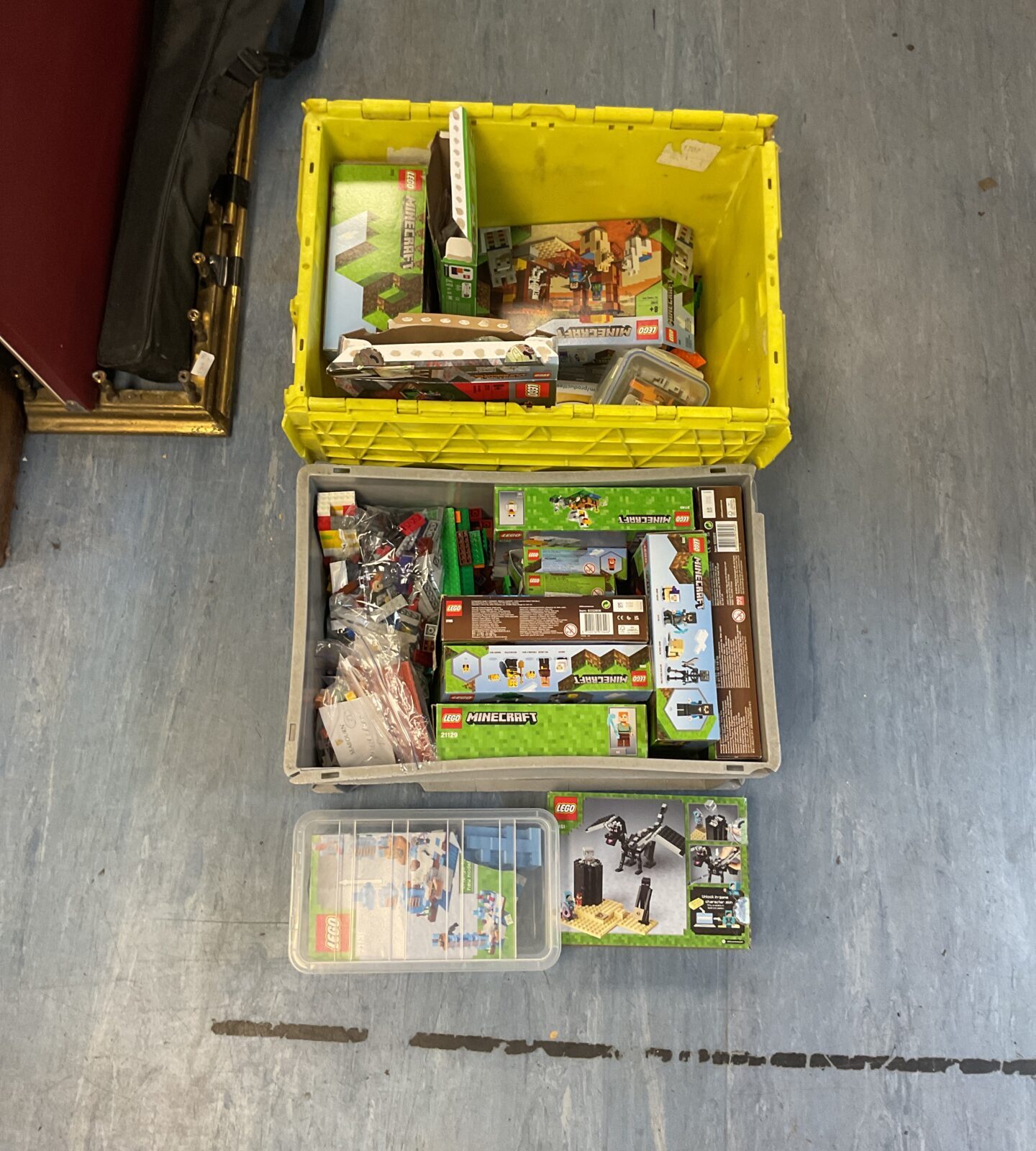 Two boxes full of lego minecraft sets and more with minifigures