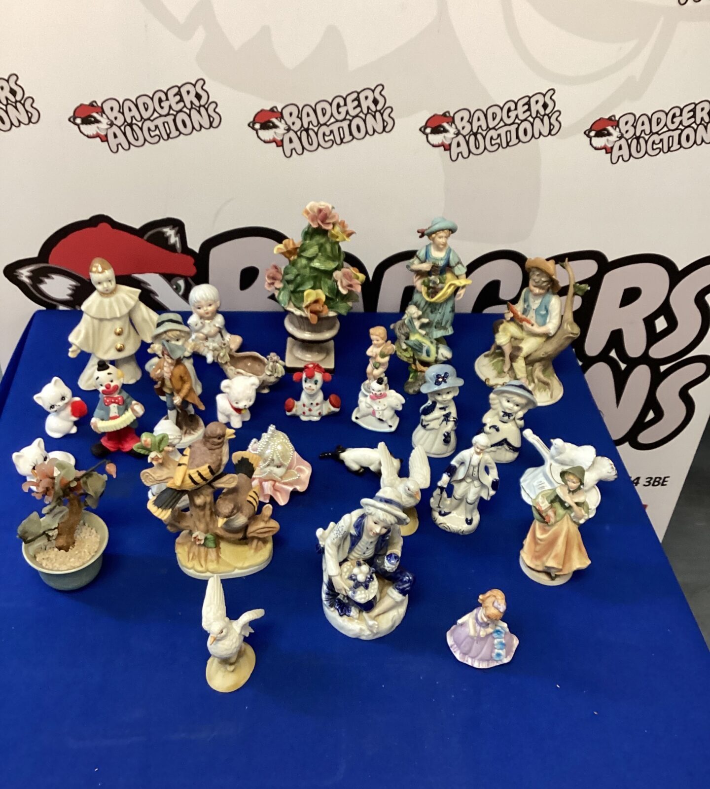 Large quantity of porcelain figurines and birds