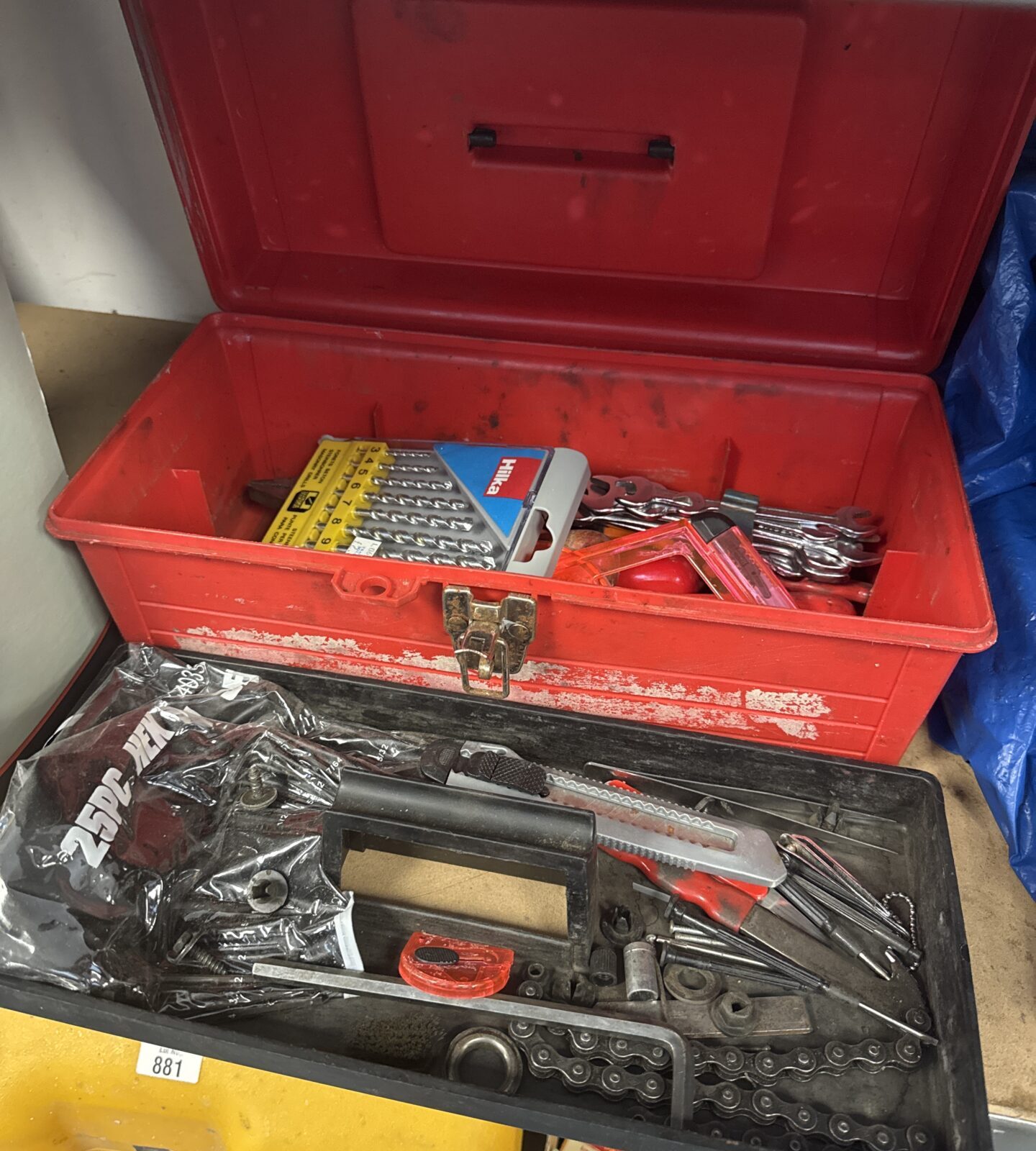 Small plastic toolbox with contents