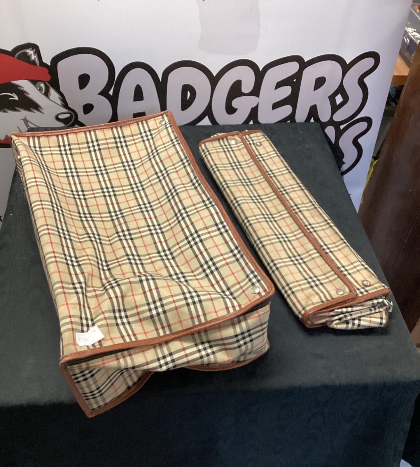 Two folding Burberry style travel cases
