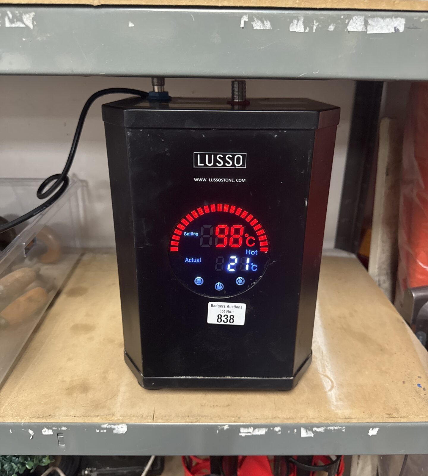 Lusso instant hot water appliance. Powers on untested further