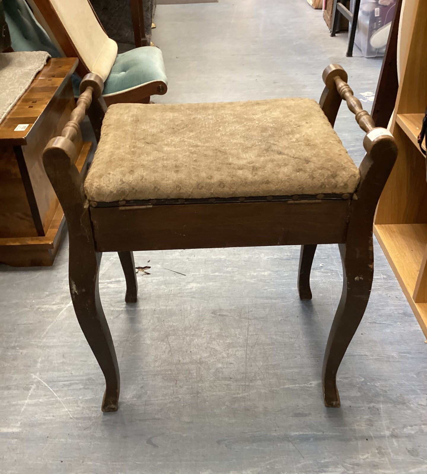 Antique piano stool with sheet music compartment