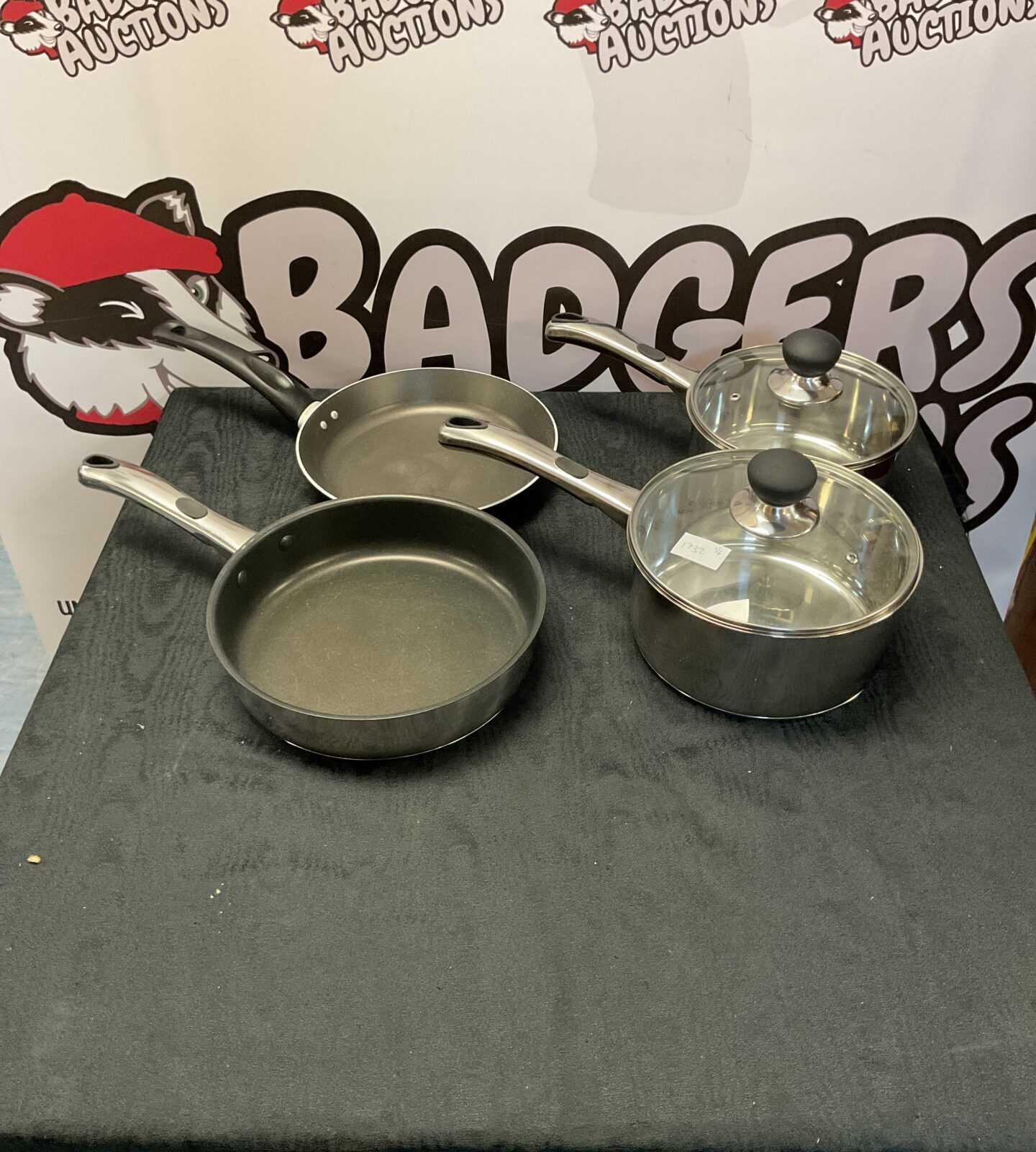 Two sabichi pans and two sabichi stainless steel pots