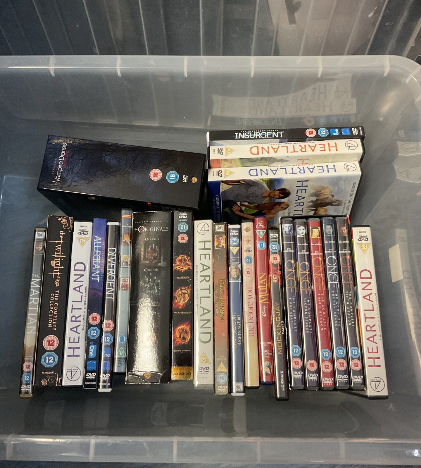 Box of dvds inc vampire diaries boxset