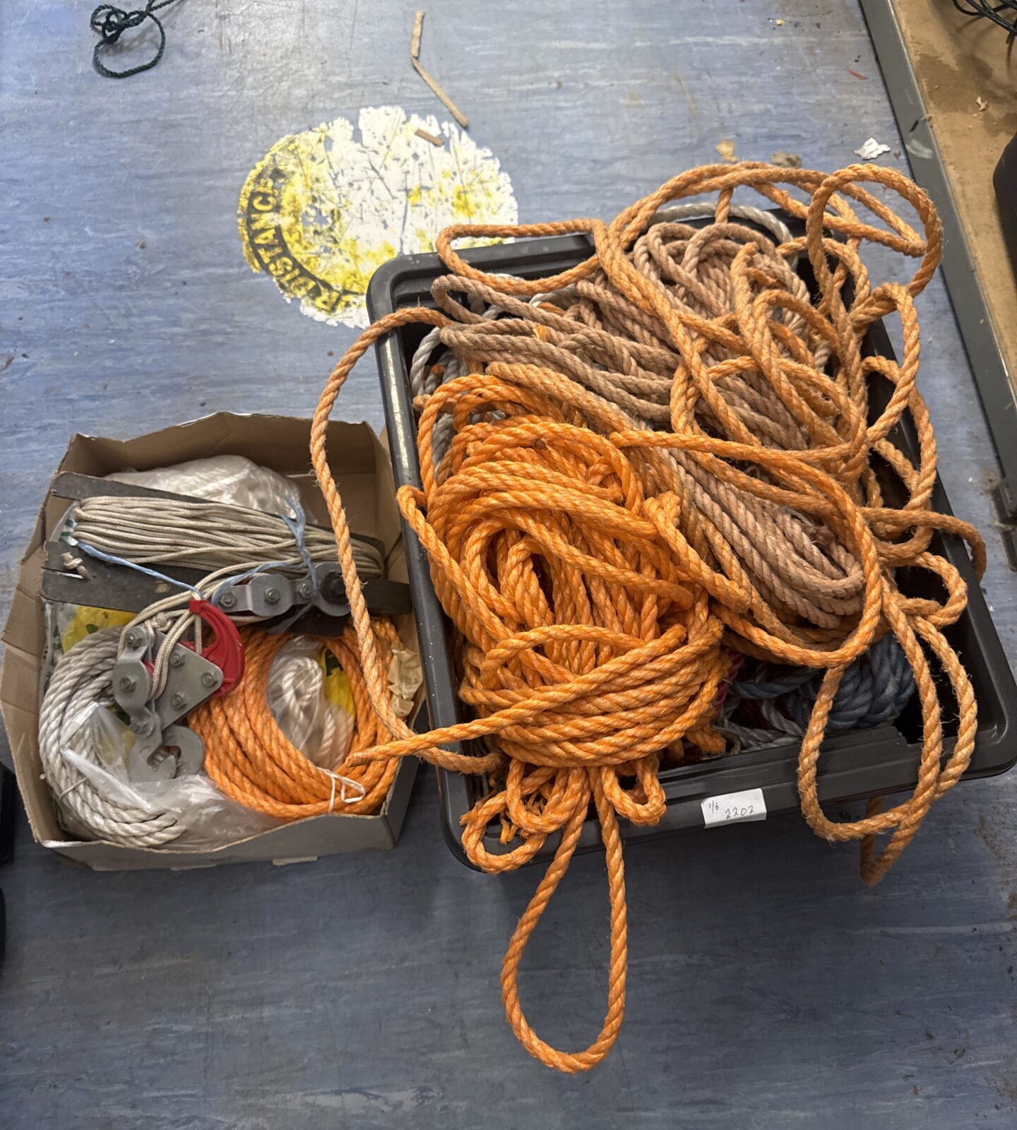Two boxes of rope with a small pulley