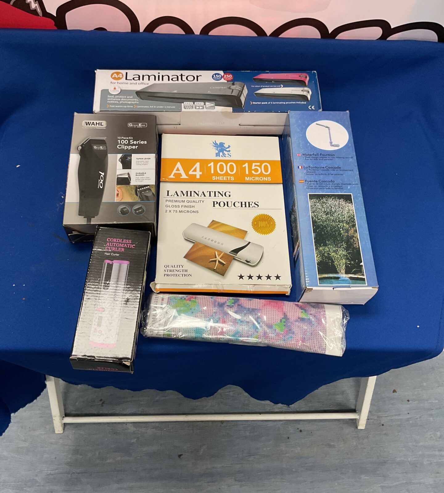 Box of mixed inc wahl trimmer and laminator