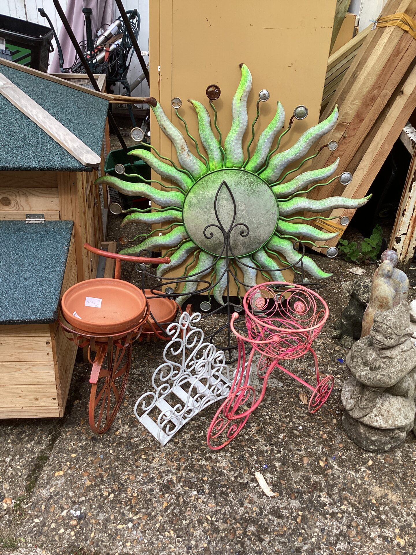 Selection of metal garden ornaments and planters