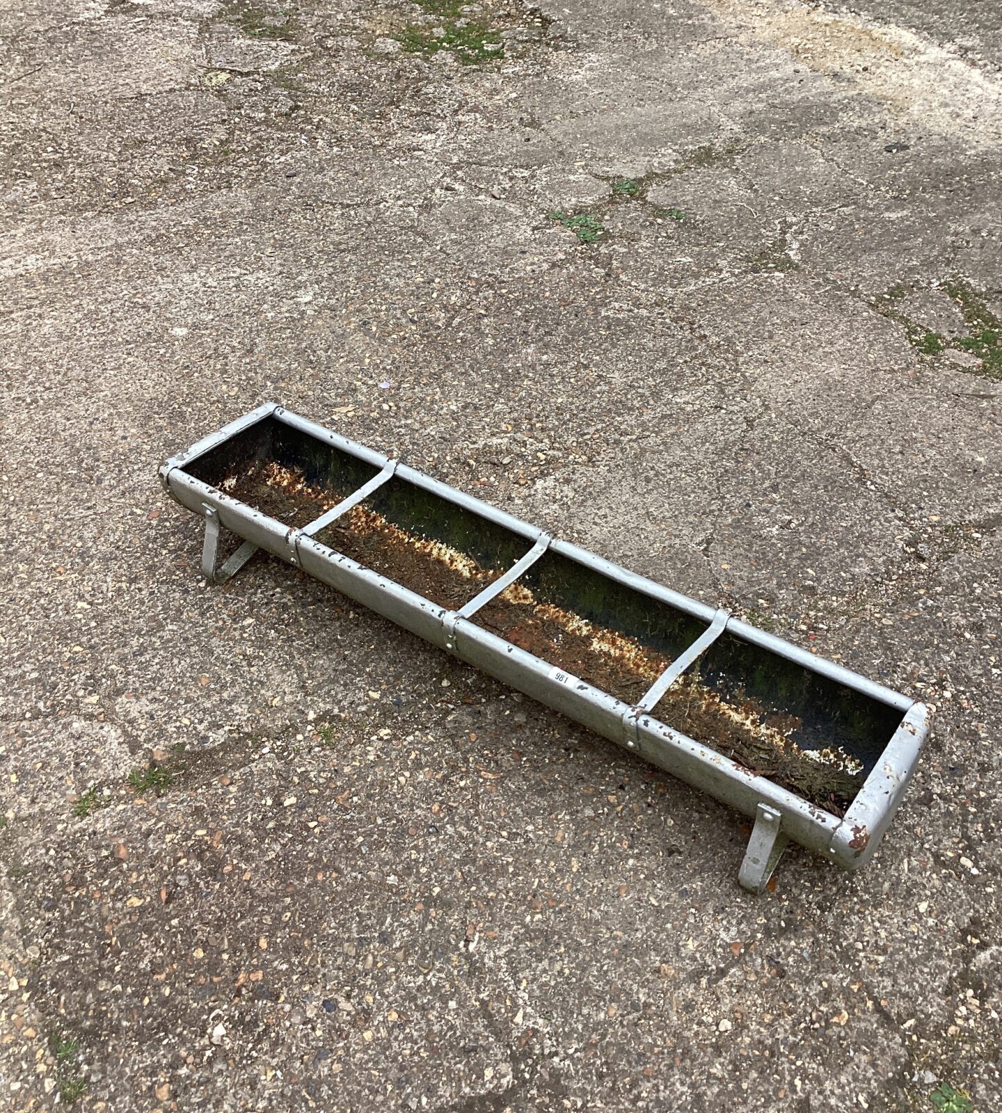 Metal animal feed trough