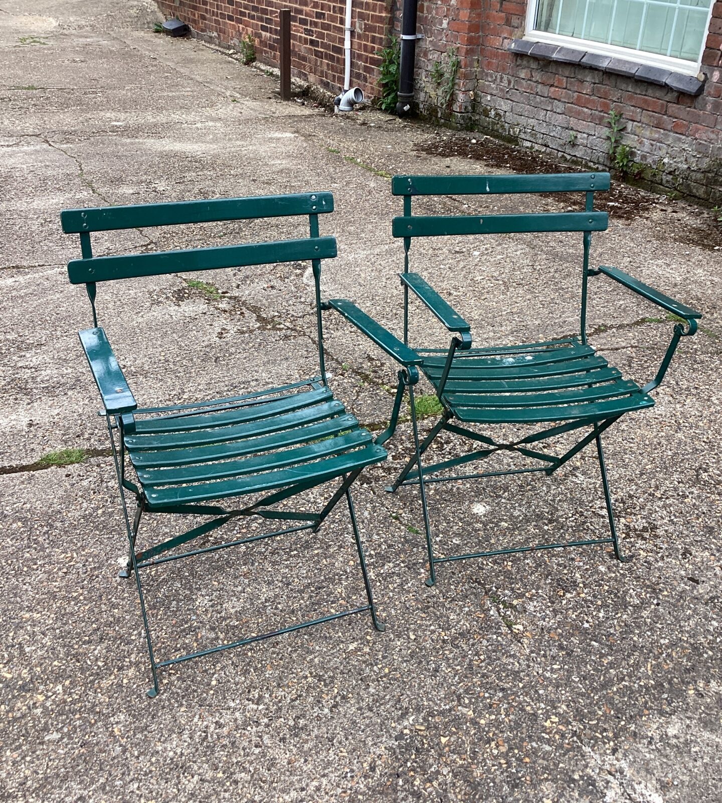 Two Folding metal chairs