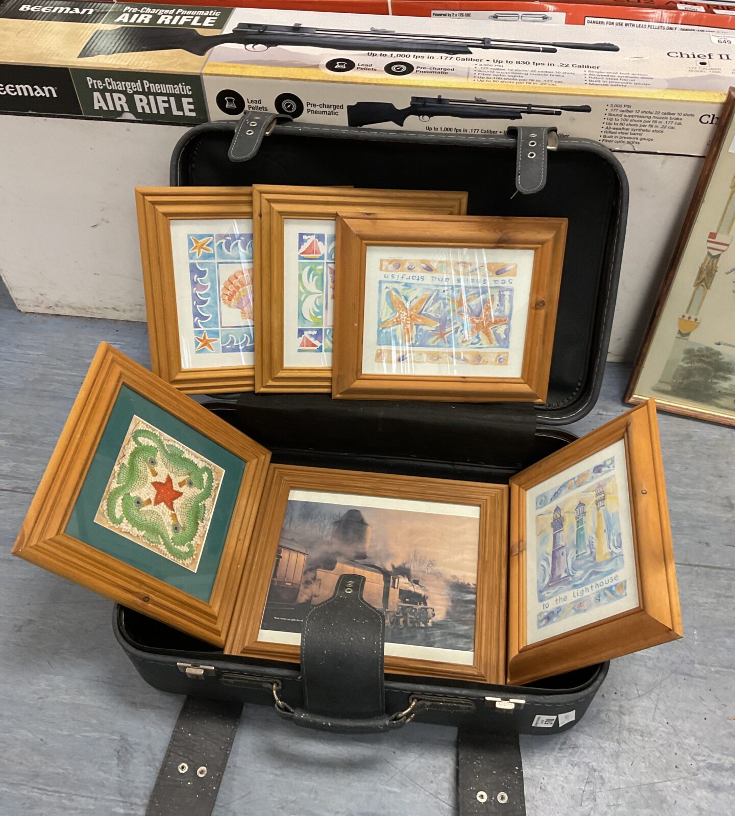 Case of prints in pine frames