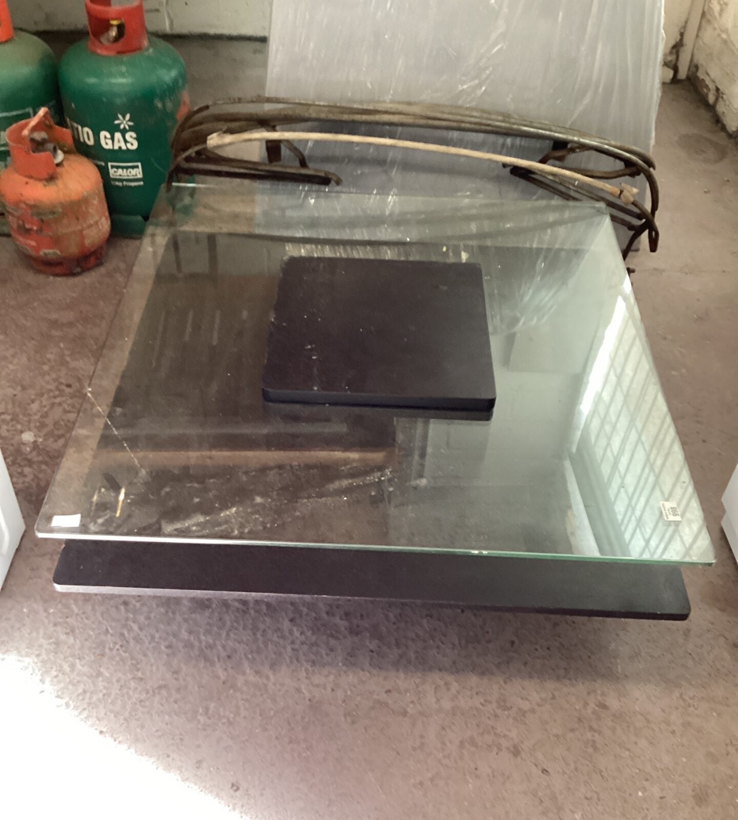 Large low level glass display table