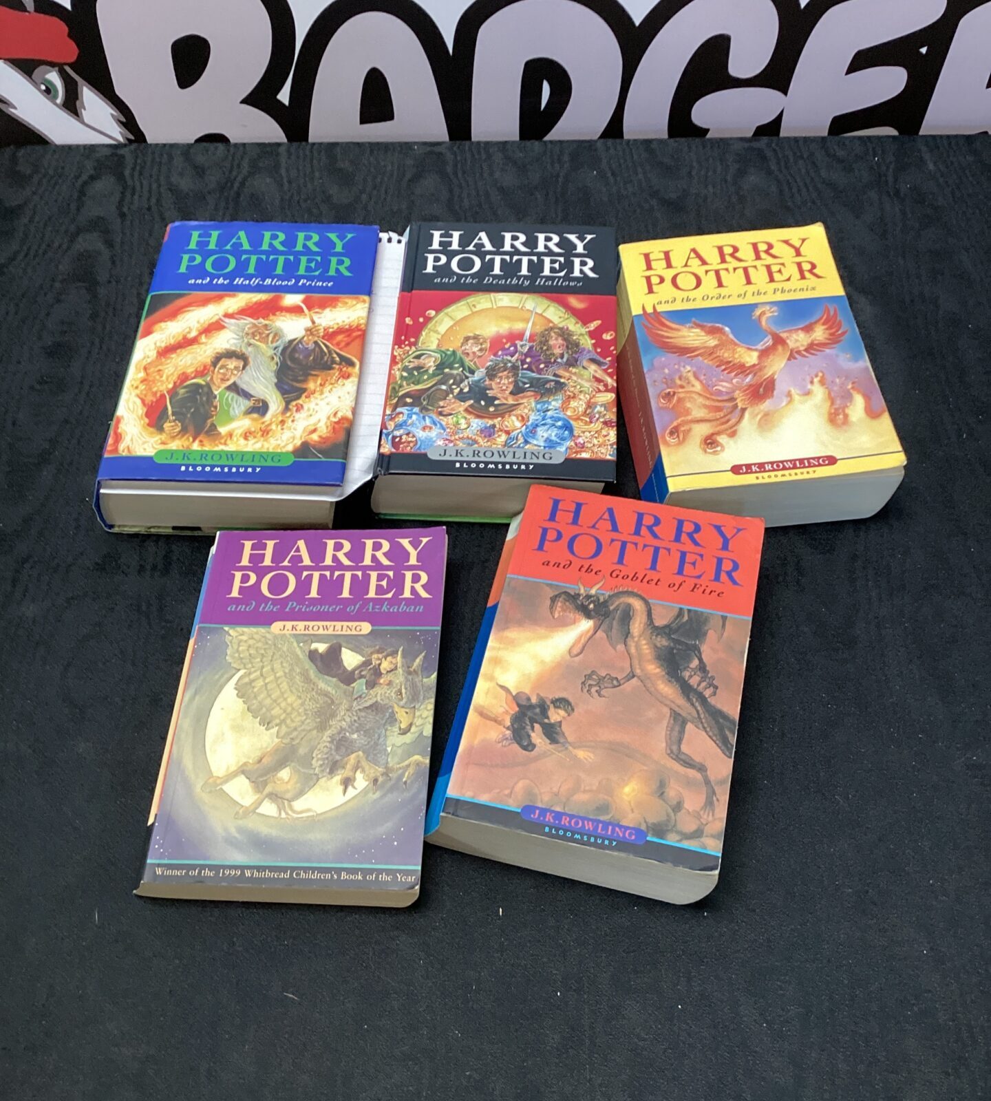 Five harry potter books inc the half blood prince with error on page 99 & two first editions
