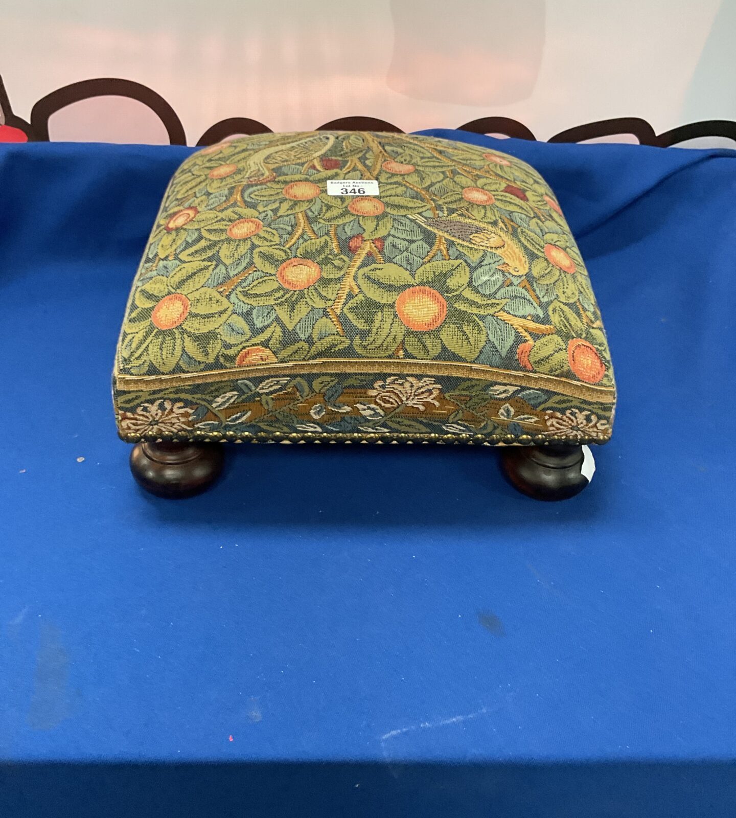Floral patterned footstool
