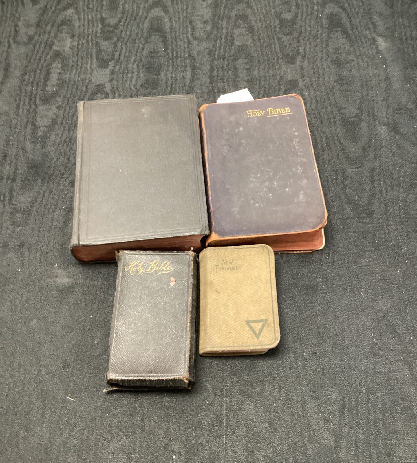 Four antique bibles