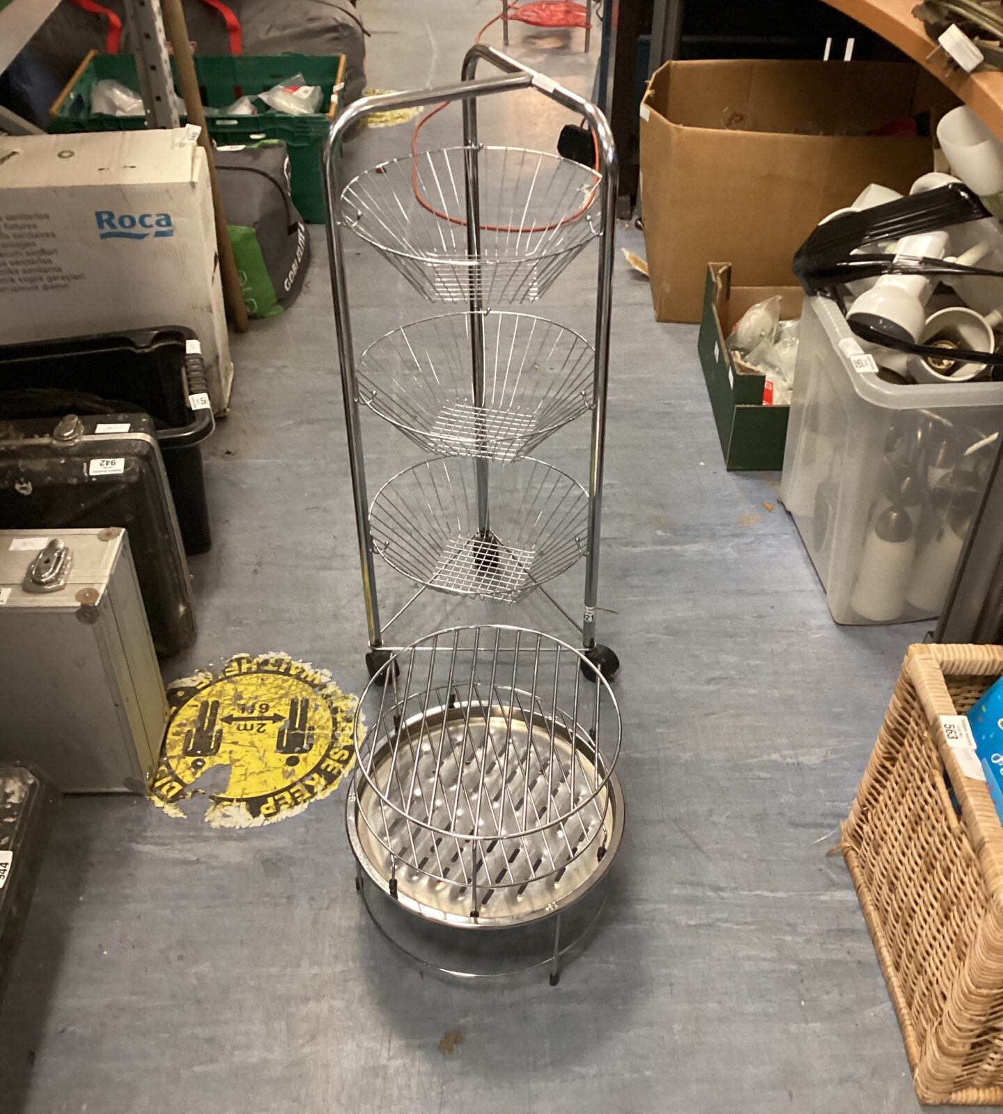 Metal wire framed vegetable rack with rotisserie stands