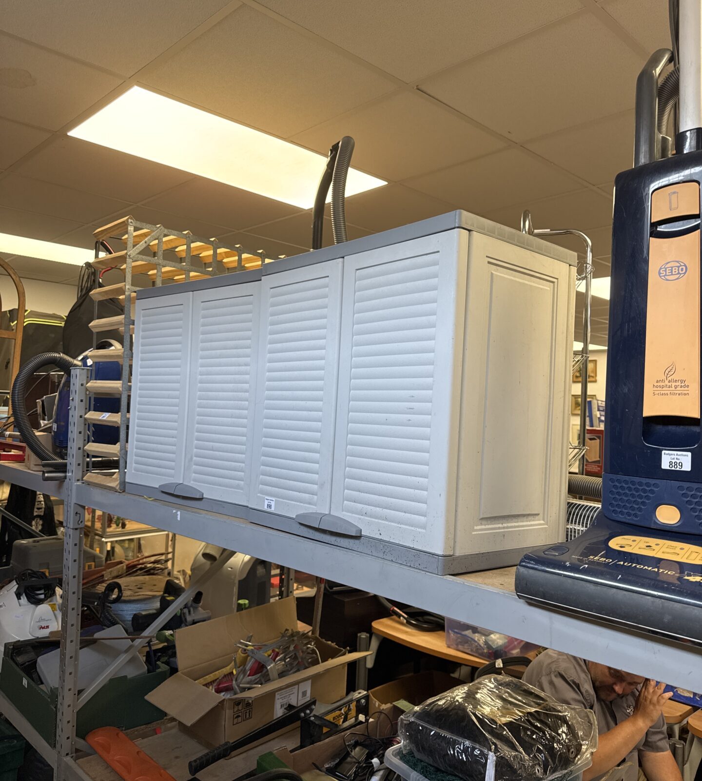 Two medium sized plastic greenhouse/garden storage cabinets