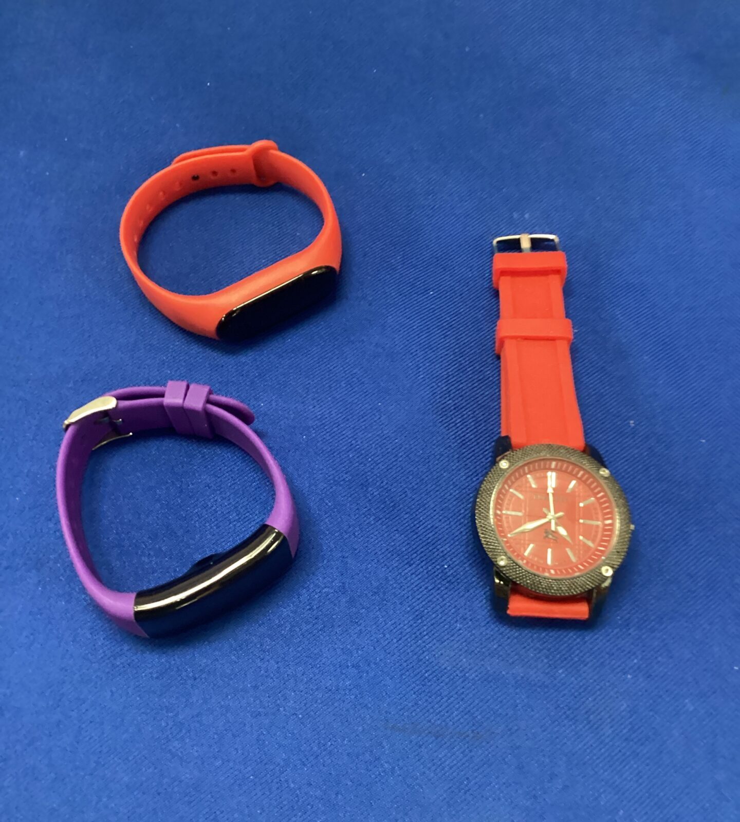 Two fit bits & burberry style wrist