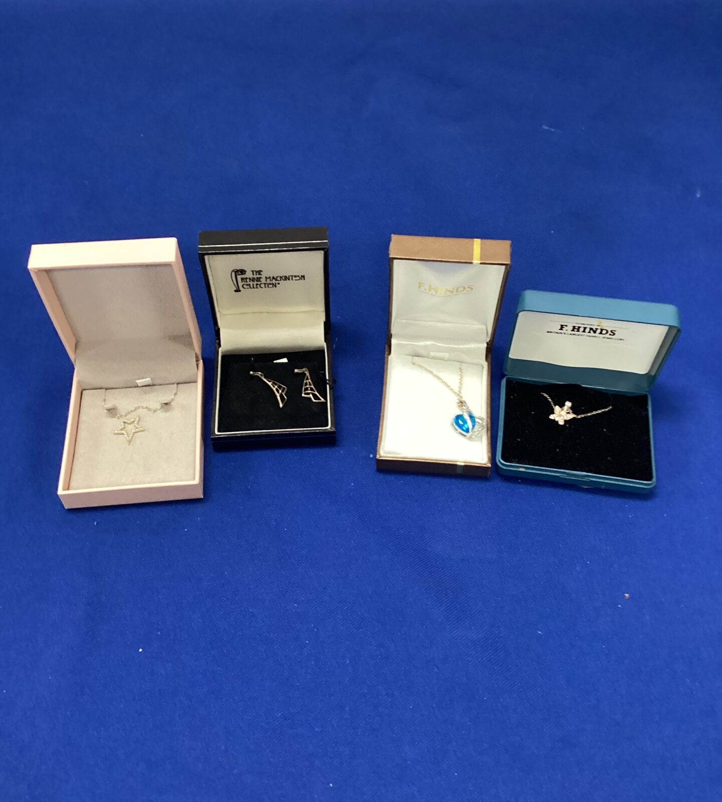 Three silver pendant necklaces & pair of silver earrings