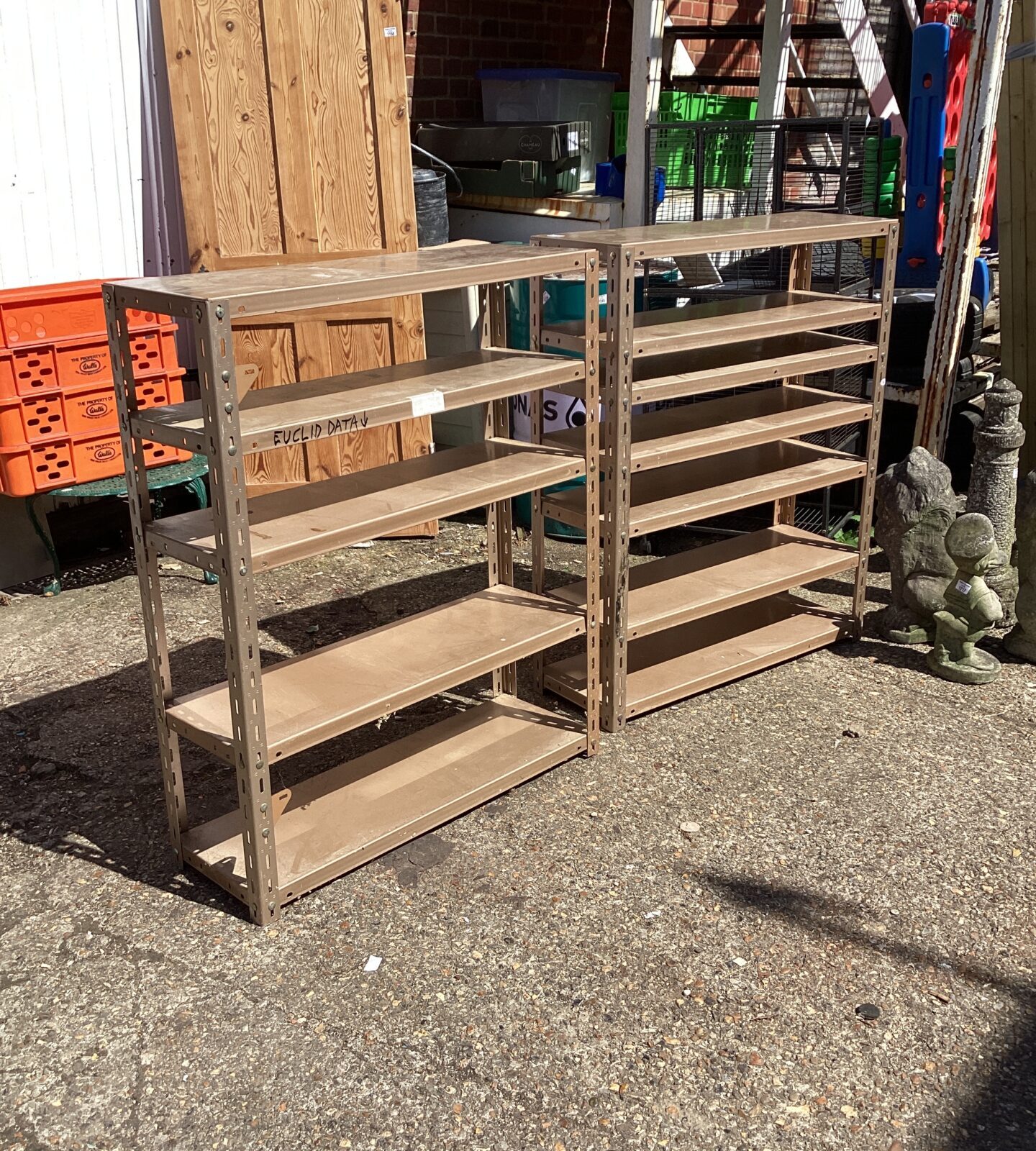 Two metal shelving units