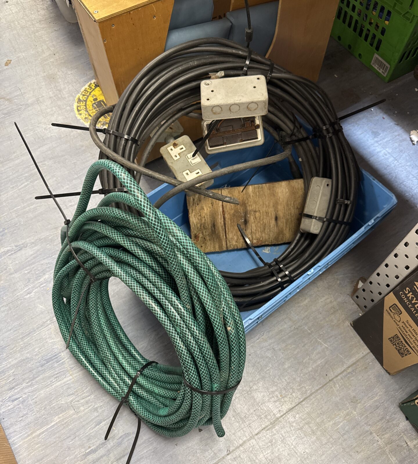 Hosepipe reel with reel of thick power cable with plug socket attachments (one socket needs attention)