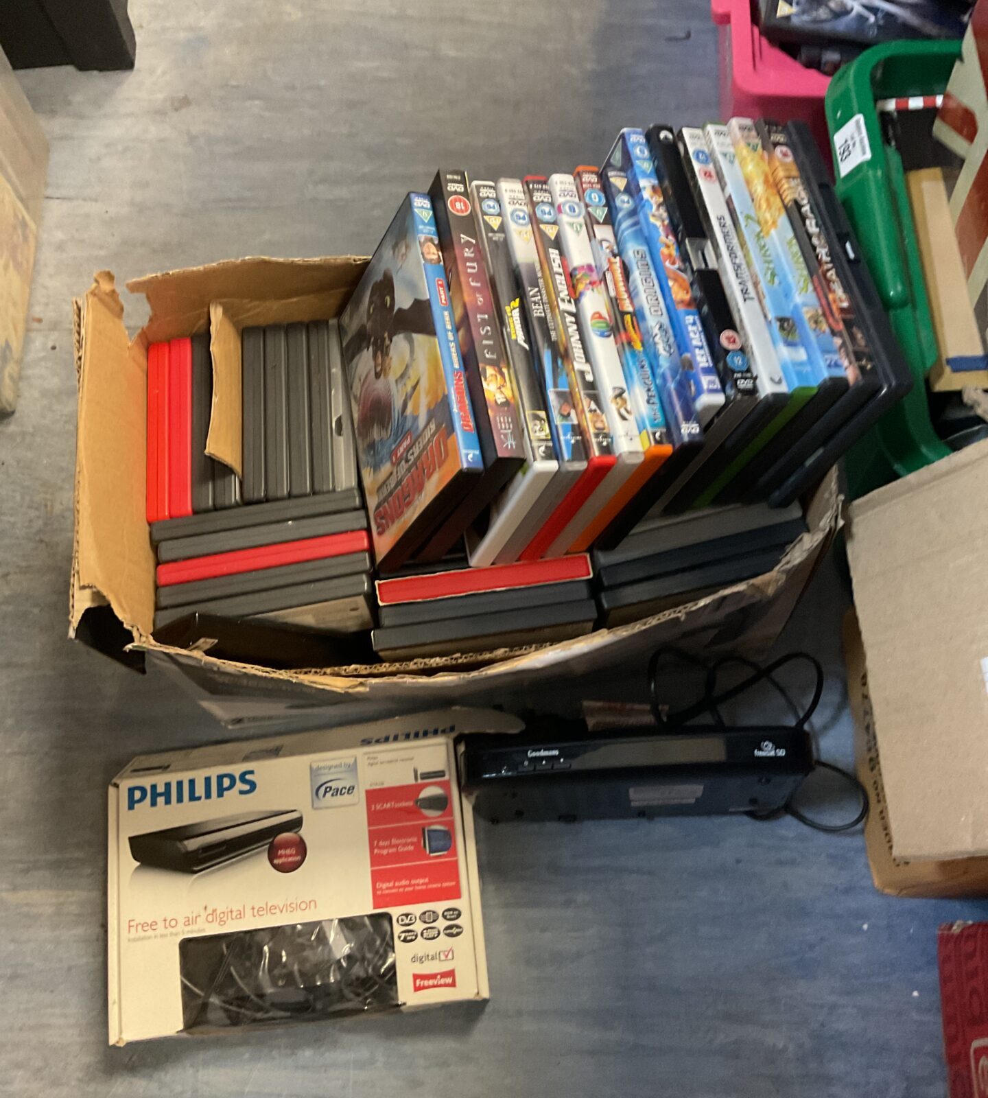Box of childrens dvds & freesat tv box