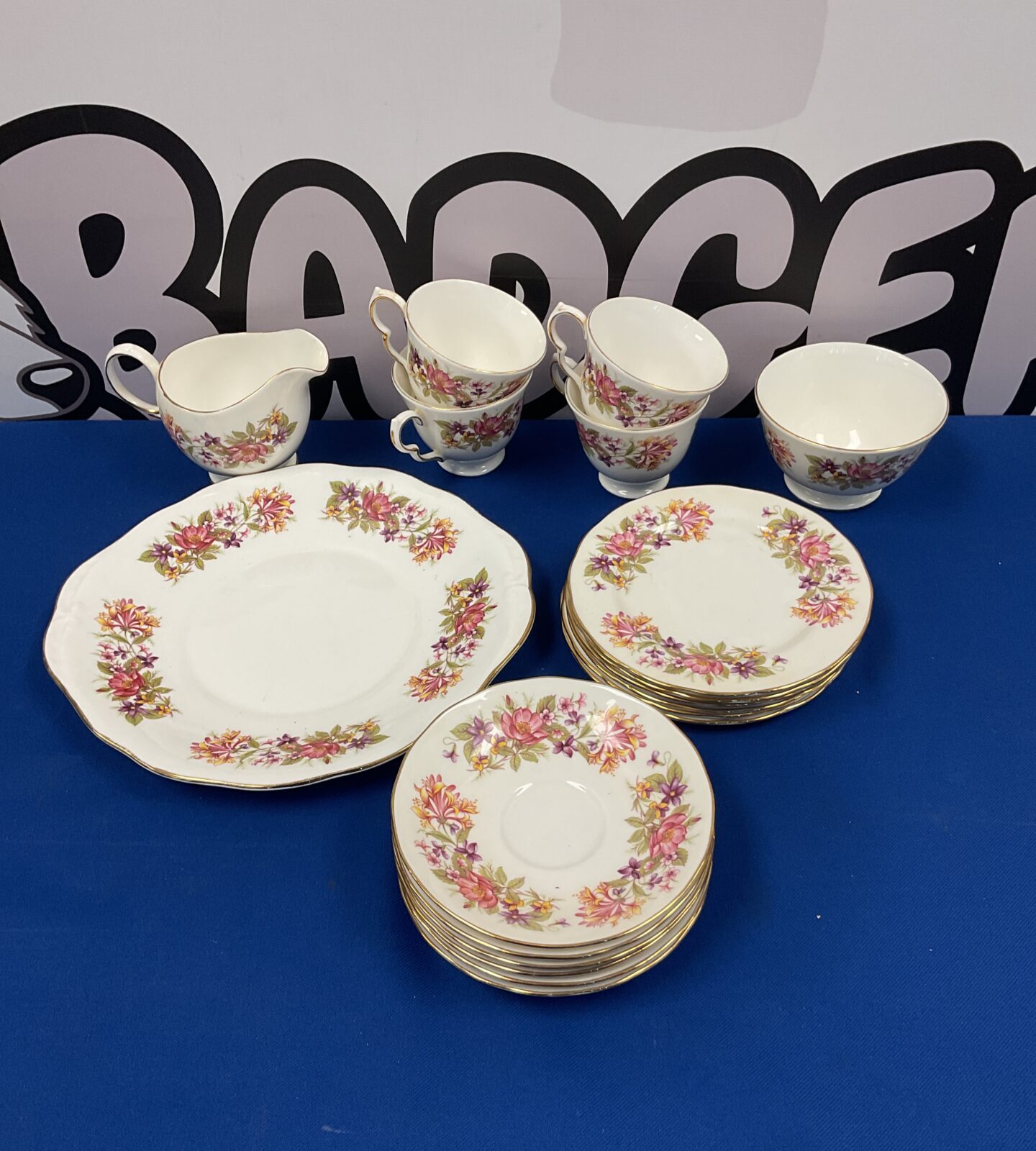 Colclough floral teacups, saucers & plates