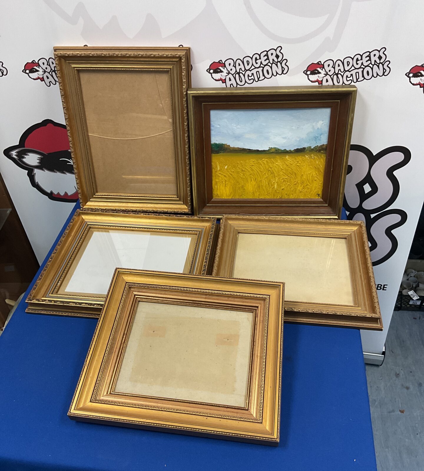 Five gilt picture frames