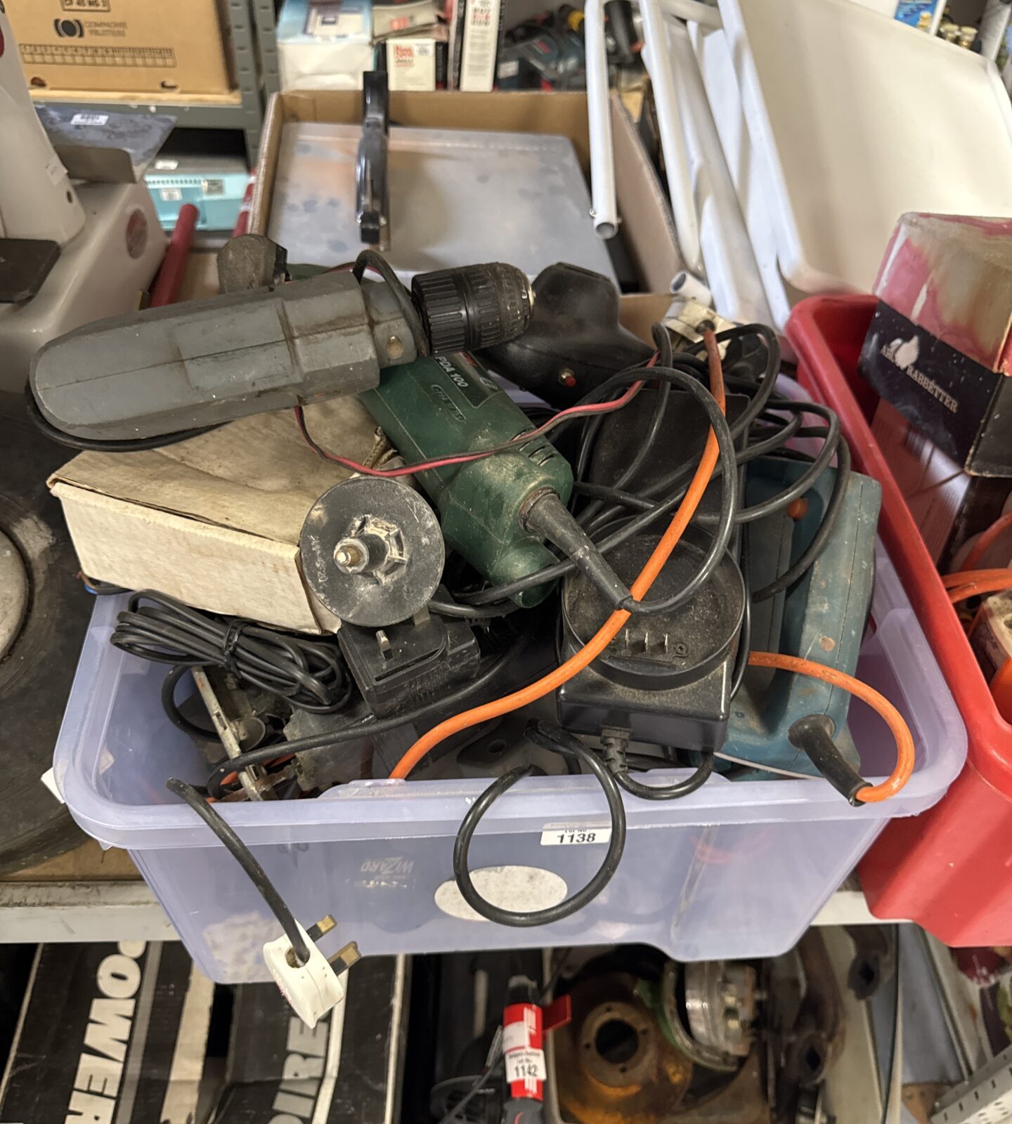 Box of assorted untested power tools