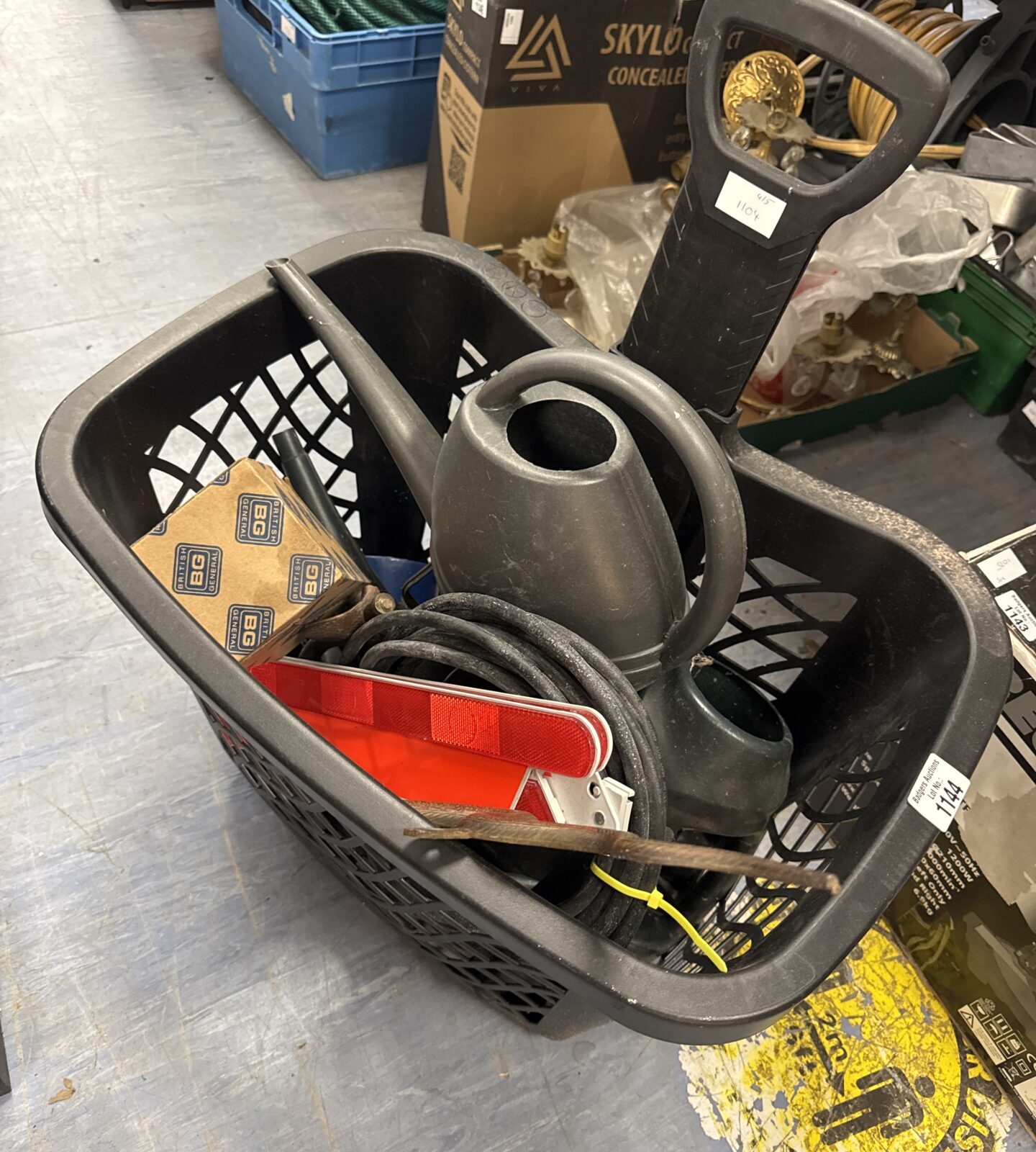 Wheeled basket of shed clearance items