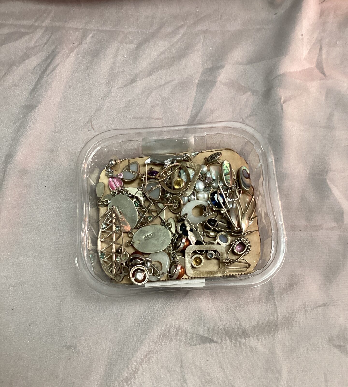 Tub of costume jewellery some silver