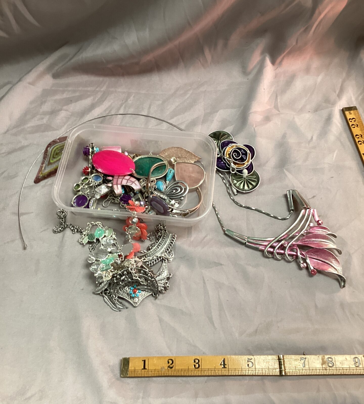 Tub of costume jewellery some silver