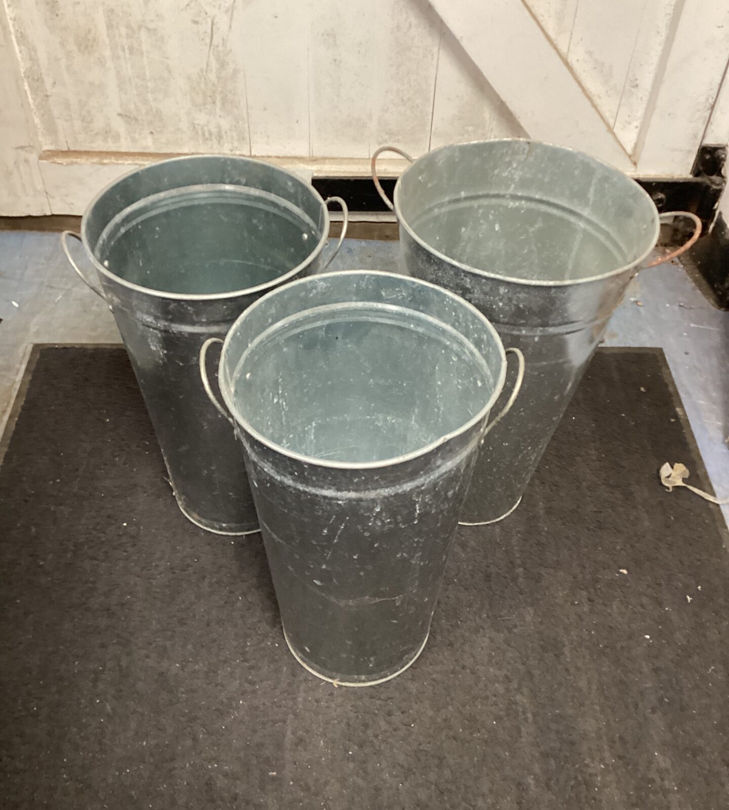 Three galvanised buckets