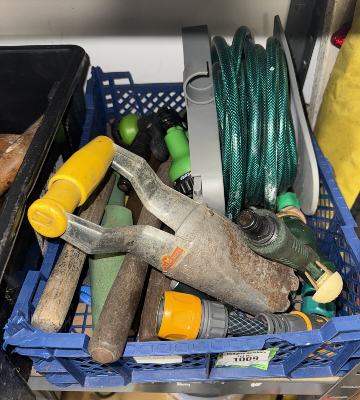 Basket of assorted gardening items