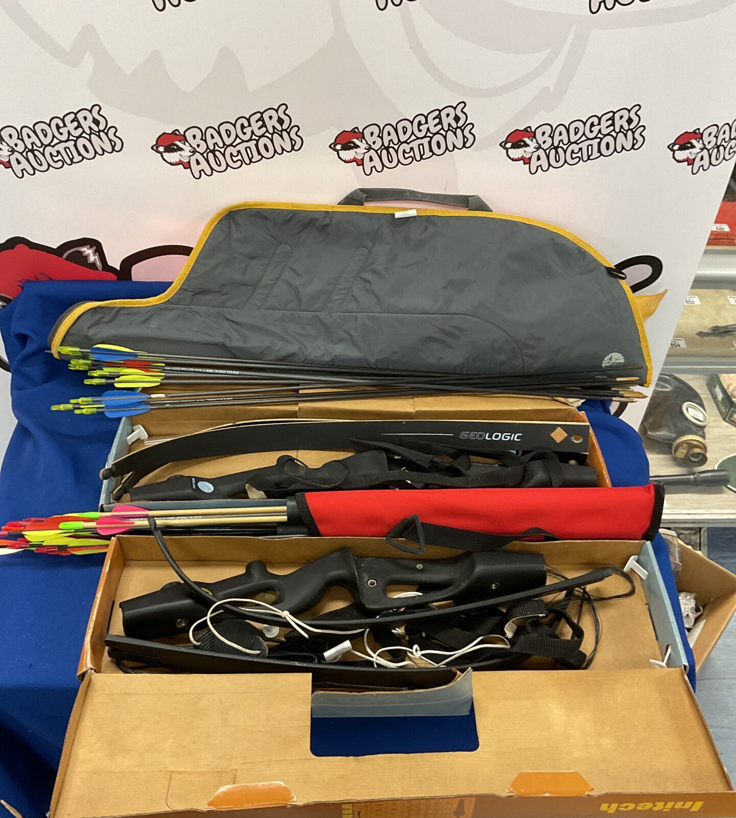 Two geologic adult compound bows 58” 15lbs and 70” 22lbs with two quivers of arrows