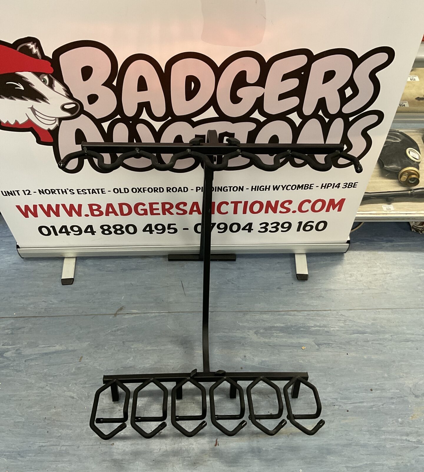 Metal fold down Gun rack for six guns