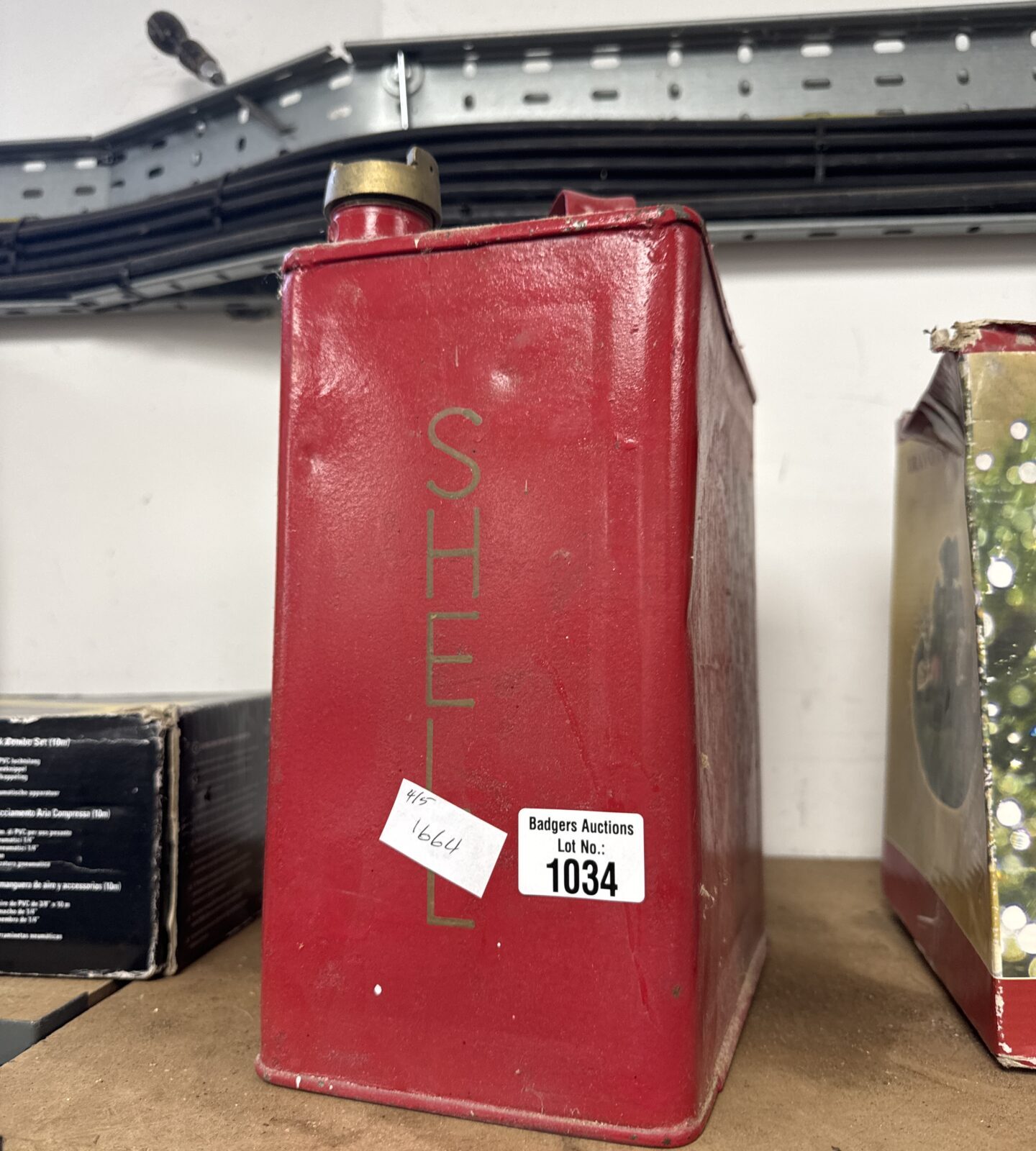 Shell fuel can with shell brass cap